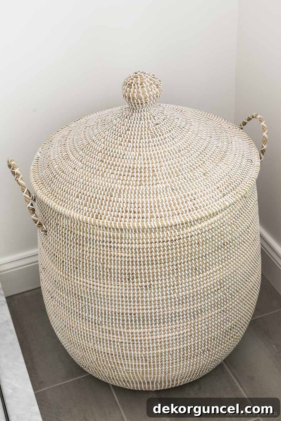 Effortless Bathroom Style for an Instant Update 23 The prettiest basket used as a hamper, exemplifying beautiful bathroom decor ideas