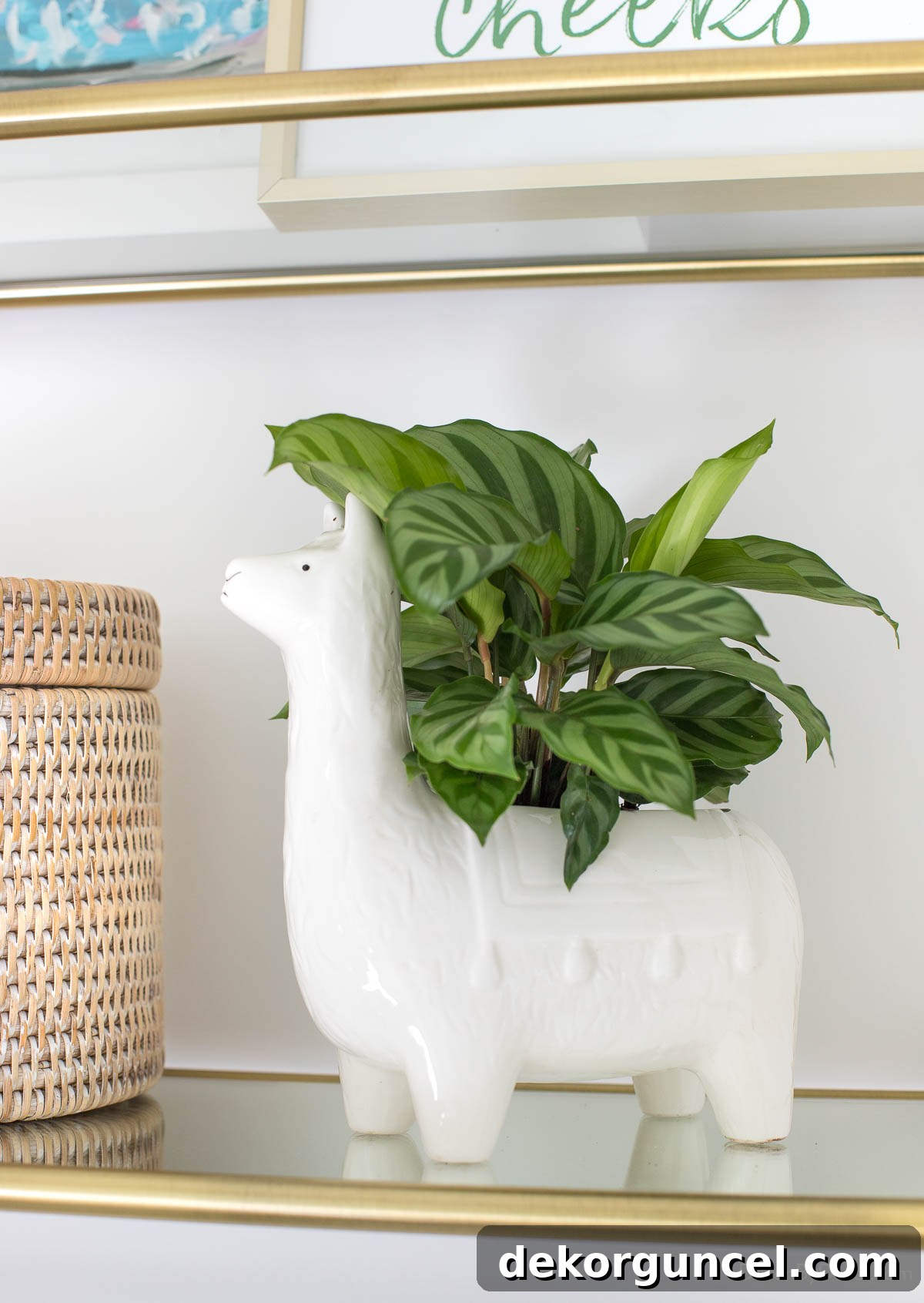 Effortless Bathroom Style for an Instant Update 4 Ceramic llama planter holding a small plant, adding charm to bathroom decor