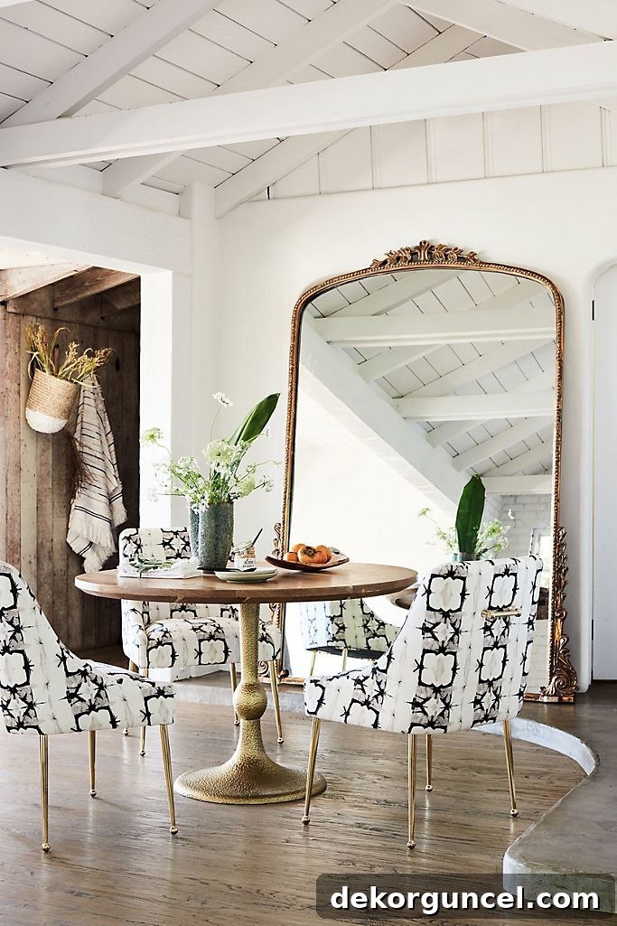 Stunning oversized floor mirror with traditional design, perfect for illuminating and expanding a bare wall in a living room or dining room.