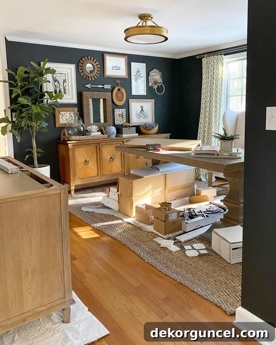 Cluttered home office during renovation before its transformation