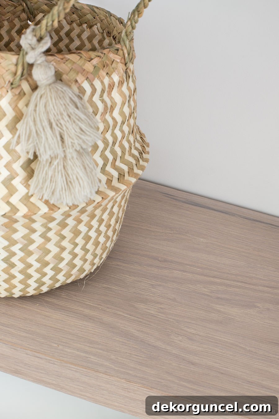 Detail shot of the pickled white finish on the floating wood shelves, showcasing their quality and texture