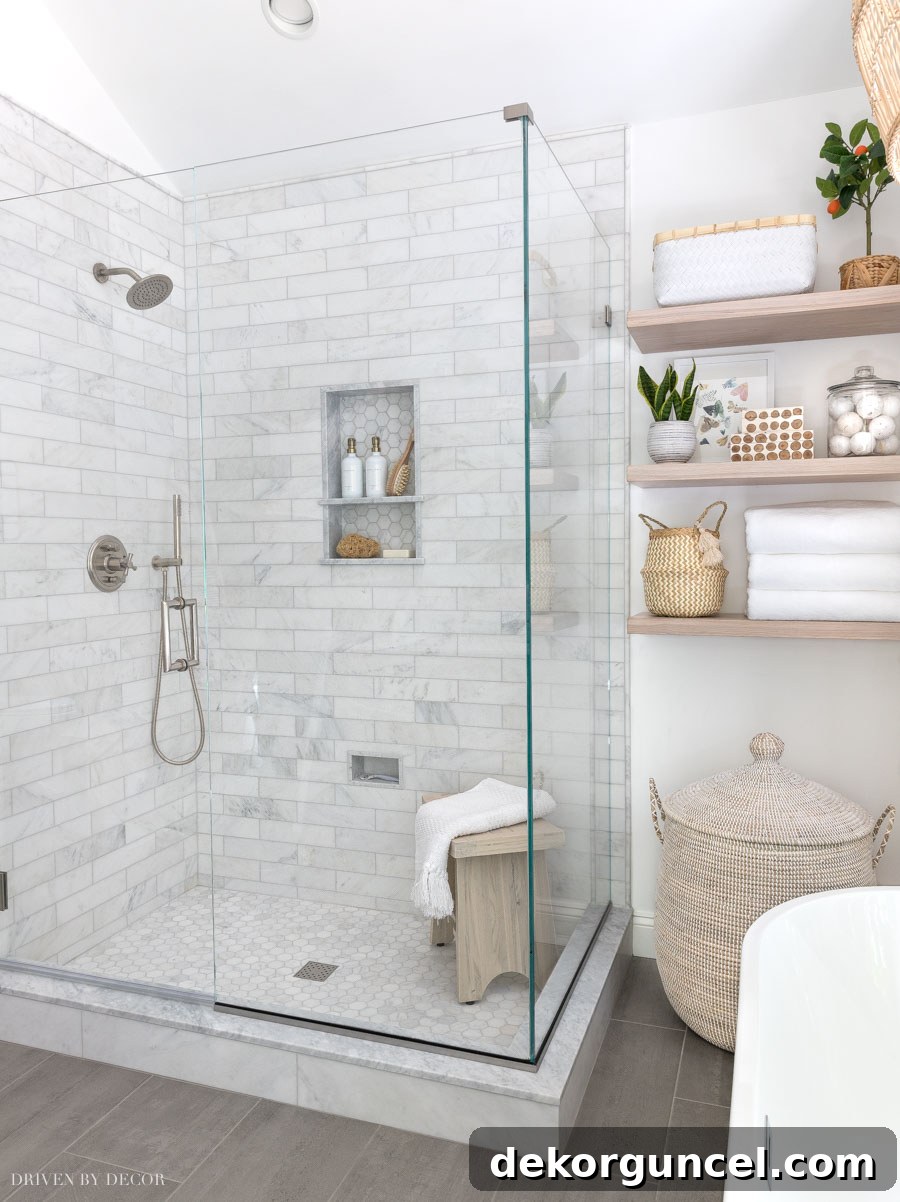 The spacious and elegant marble shower in our newly renovated master bathroom