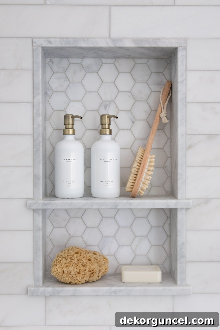 Marble tile shower niche with two elegant Carrara marble shelves, perfect for storage