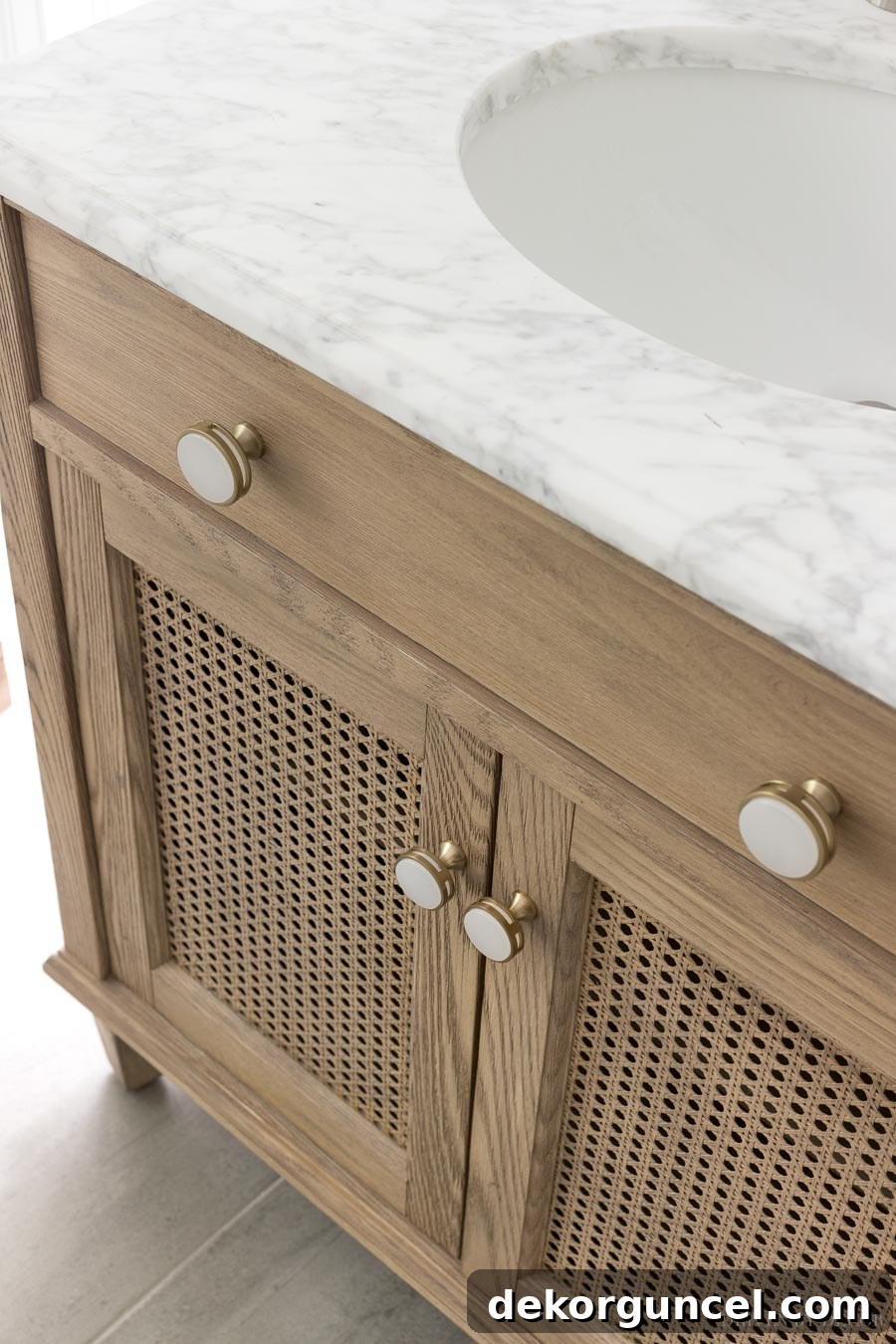 Elegant frosted acrylic and champagne gold knobs, enhancing the vanity's aesthetic