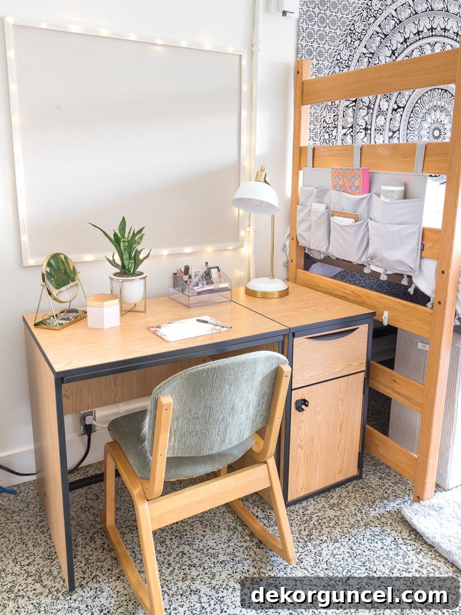 Dorm Room Essentials The Complete Guide 10 A organized dorm desk featuring a large pinboard adorned with fairy lights, perfect for photos and important notes.