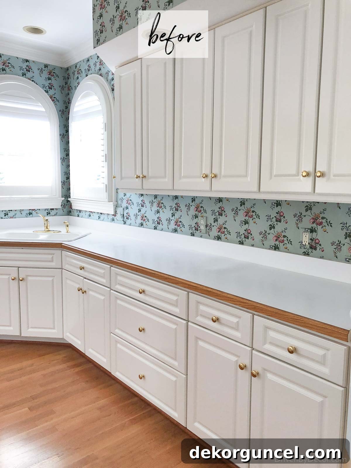 The wallpapered backsplash in our kitchen before the renovation.