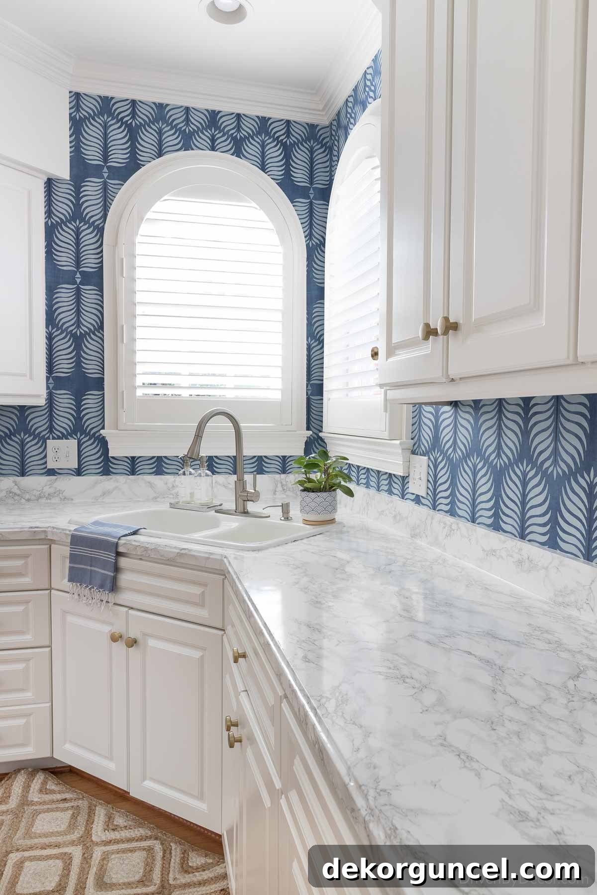 Our newly wallpapered kitchen backsplash, showcasing vibrant color and pattern.