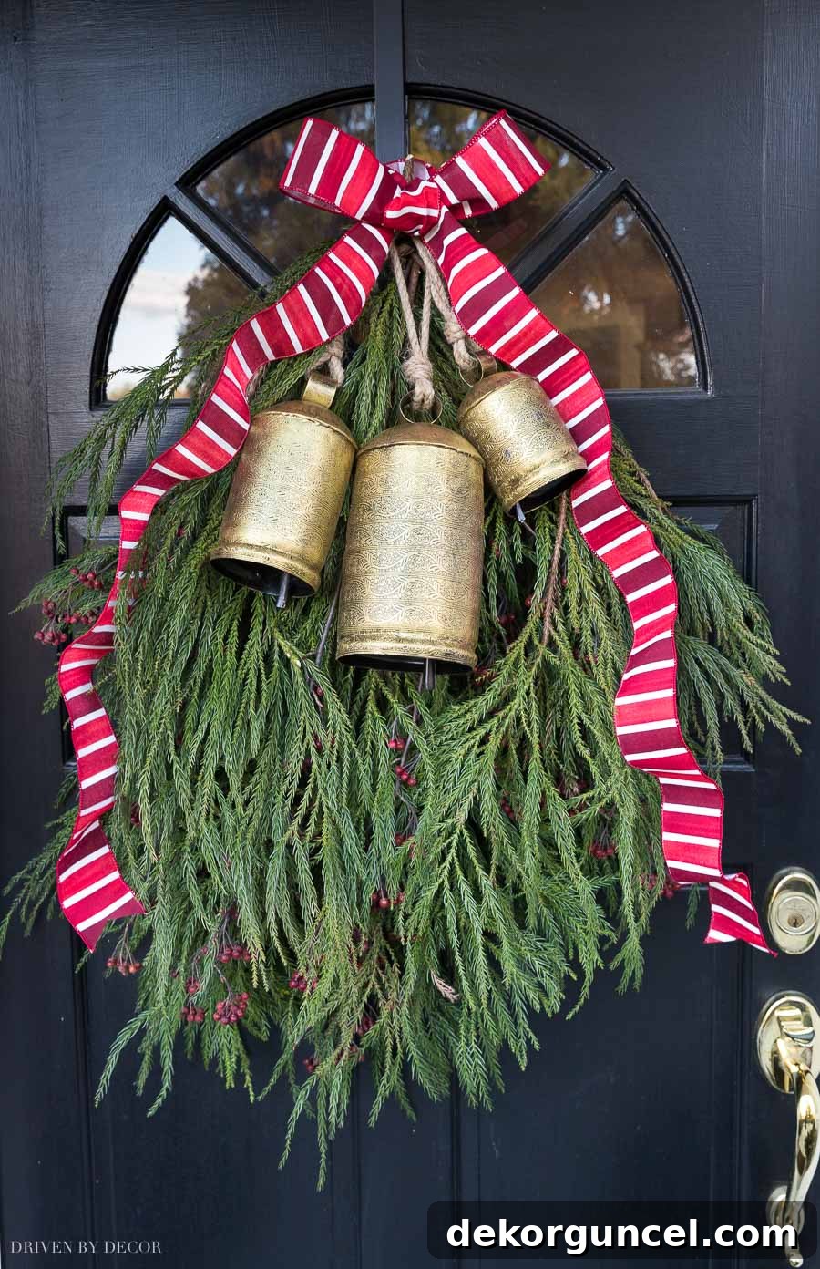 The Christmas door swag on our front door - post includes full tutorial!