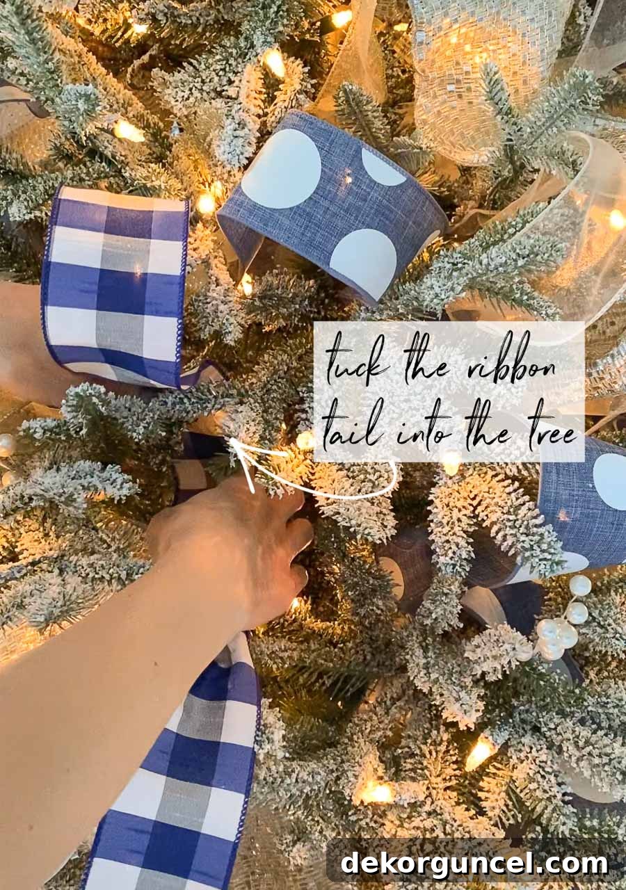 The Ultimate Christmas Tree Decorating Guide 15 Decorating with Christmas tree ribbon - a step by step how-to!