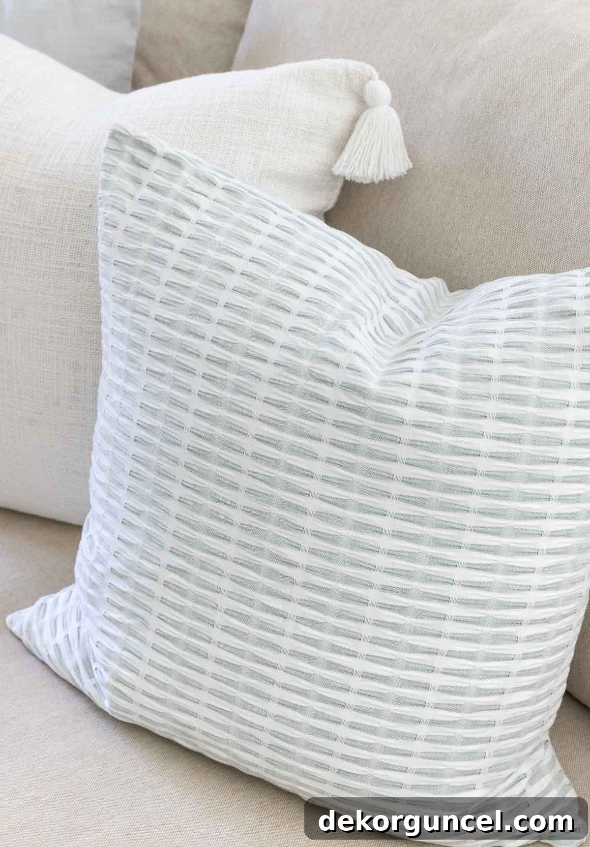 Beautiful pleated sage throw pillow adding texture to decor