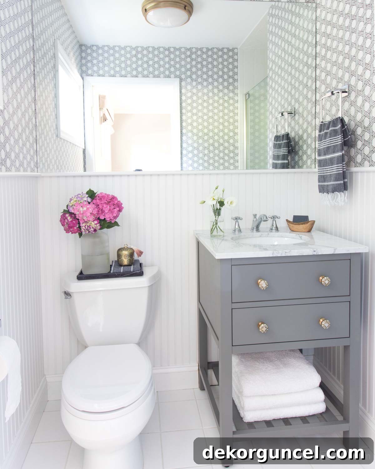 Guest bathroom after remodeling, featuring a new, functional vanity