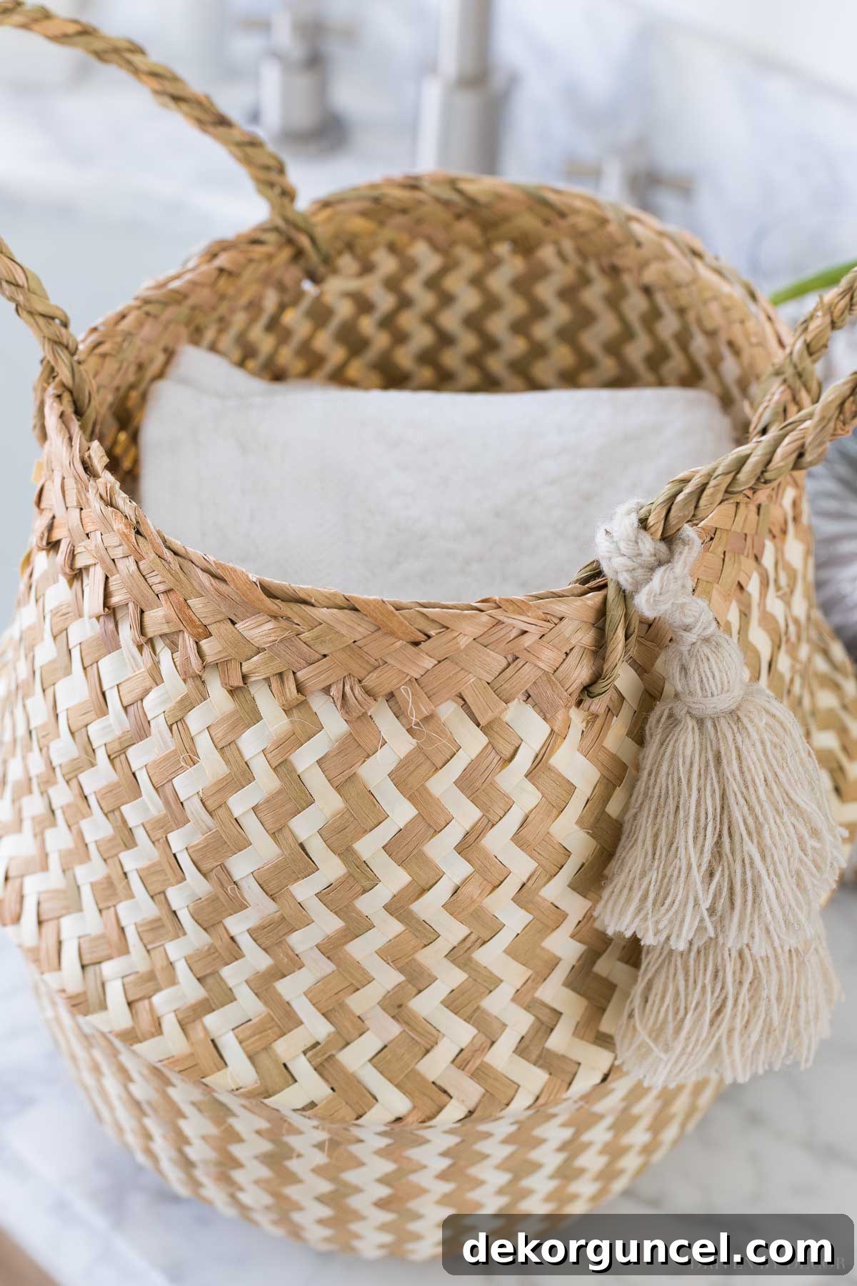 10 Master Bathroom Remodel Ideas You'll Wish Were Yours 16 Stylish belly basket holds washcloths on floating shelves in a master bathroom remodel, enhancing organization.