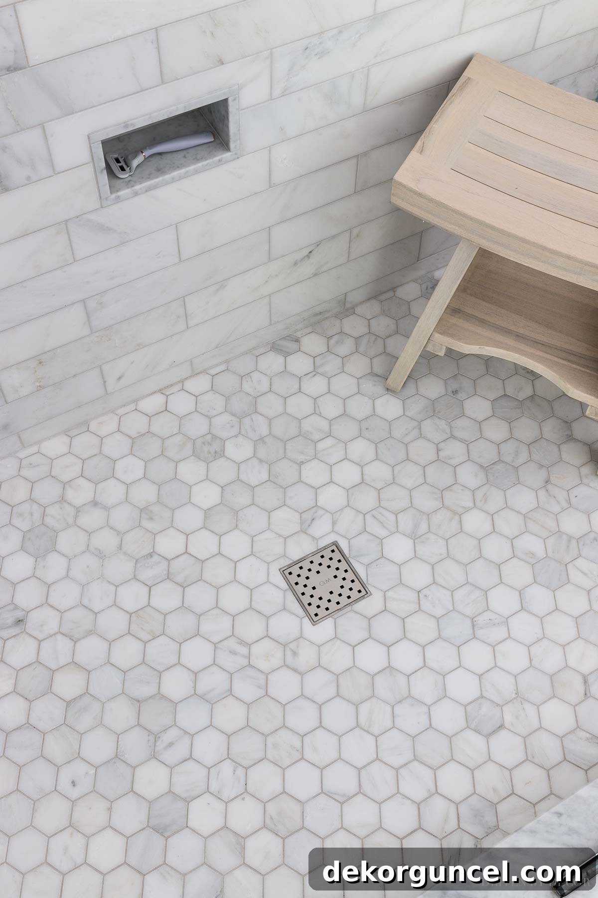 10 Master Bathroom Remodel Ideas You'll Wish Were Yours 5 Upgrade your master bathroom remodel with a stylish square shower drain for a refined look.
