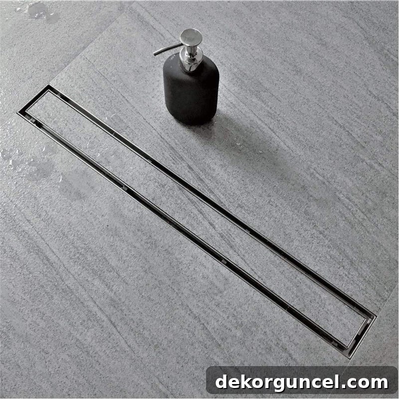 10 Master Bathroom Remodel Ideas You'll Wish Were Yours 6 A linear tile-insert shower drain creates a seamless and luxurious look in a modern master bathroom.