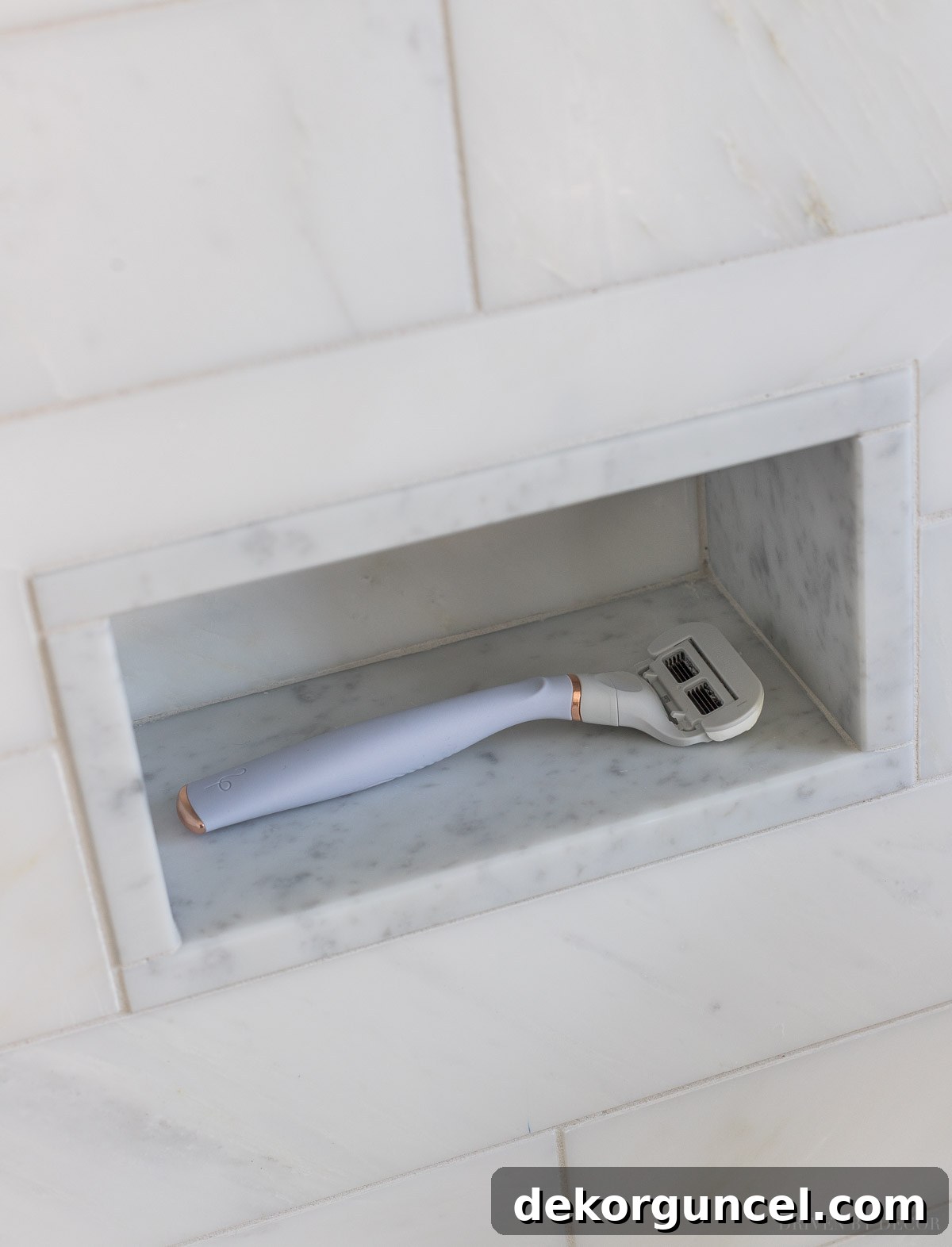10 Master Bathroom Remodel Ideas You'll Wish Were Yours 9 A clever small shower niche doubles as a footrest for shaving, a highly practical master bathroom remodel feature.