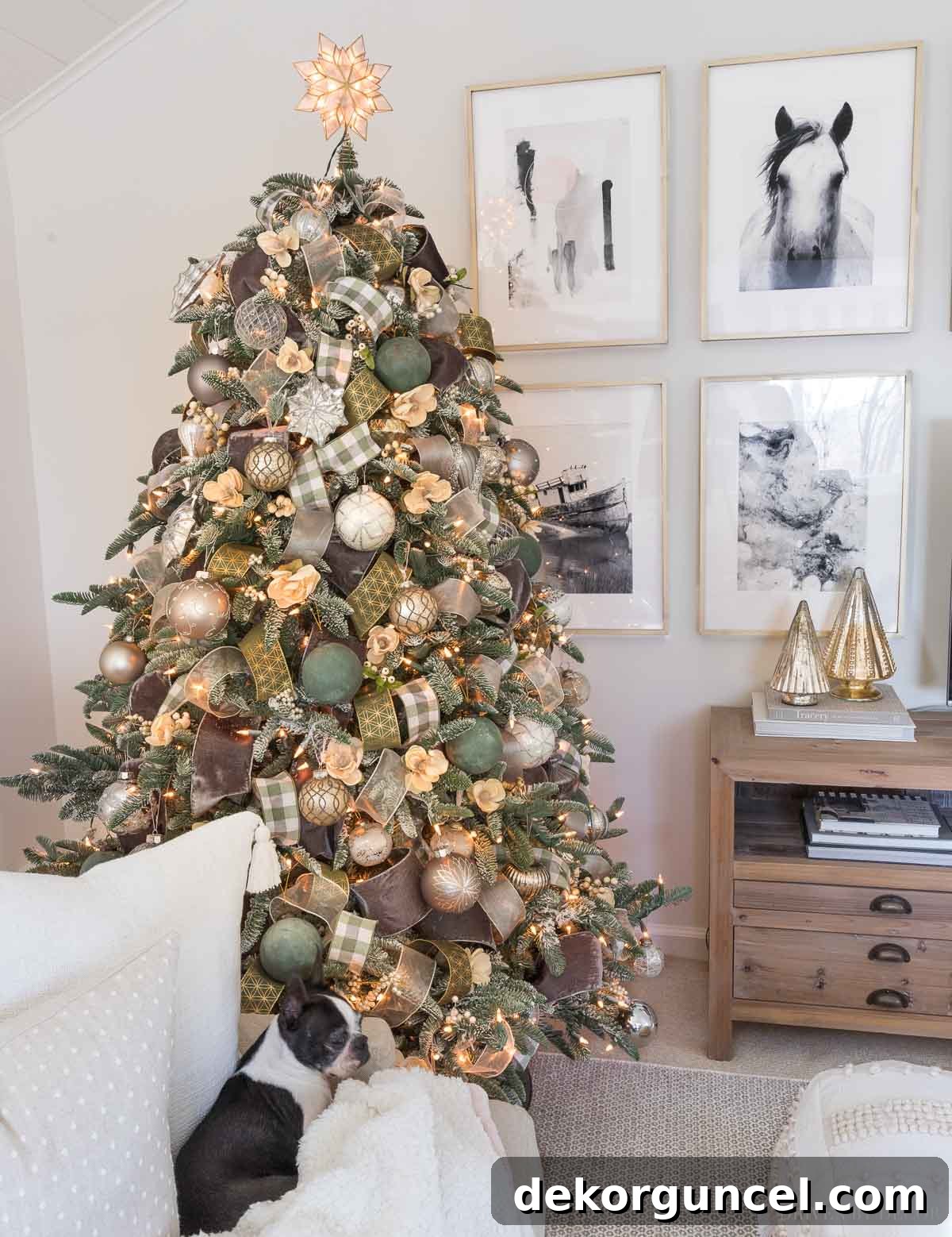 Our elegant Christmas tree adorned with green, gray, gold, and silver ribbons and shimmering ornaments, reflecting a modern holiday aesthetic.