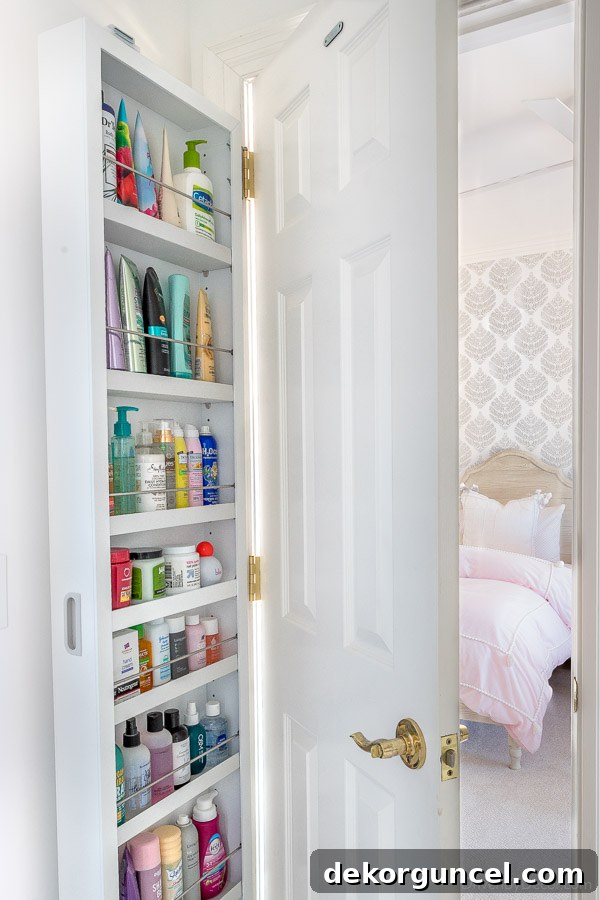 Awesome behind the door storage cabinet for maximizing bathroom space!