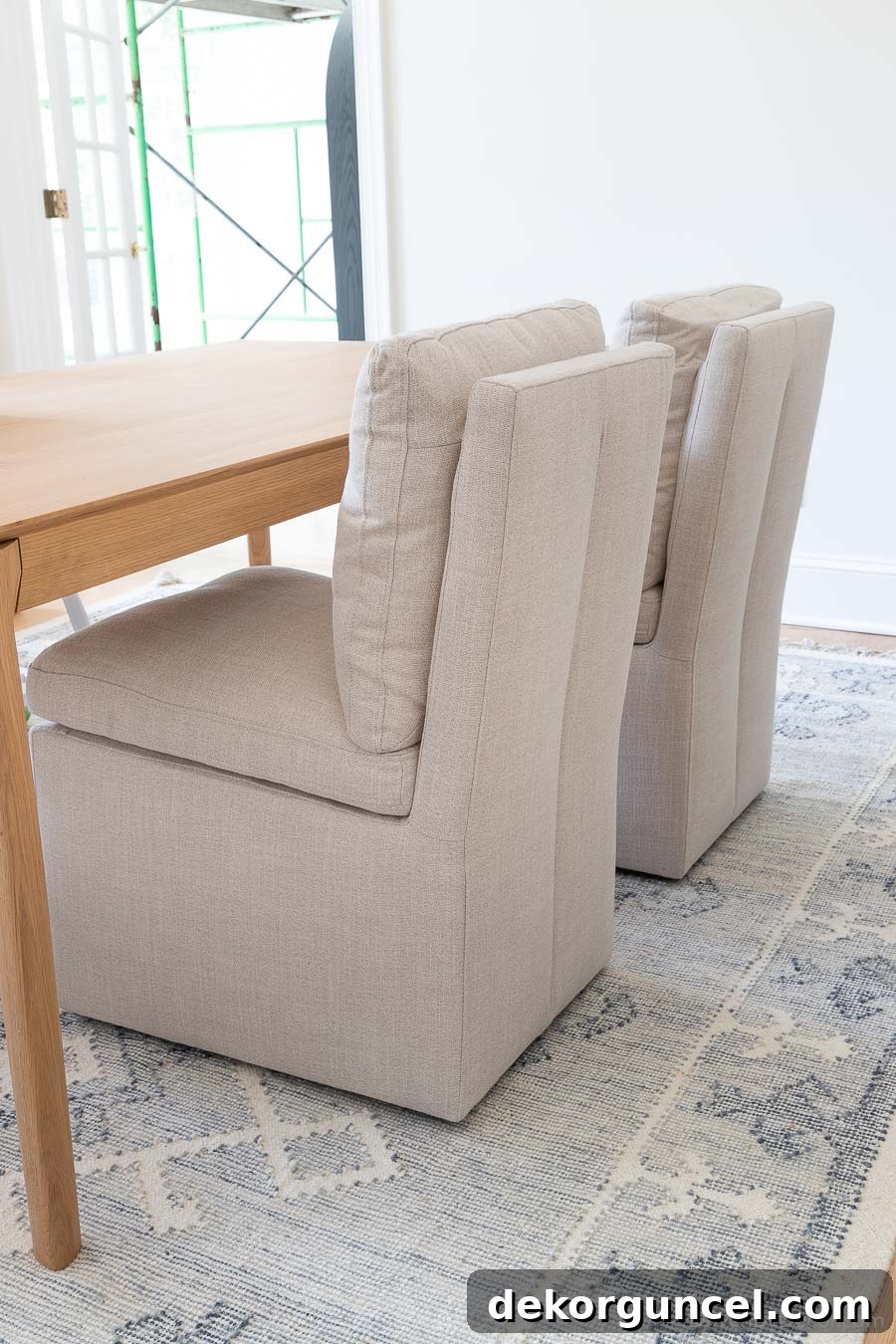 Stylish upholstered dining room side chairs on casters, combining elegance and practicality