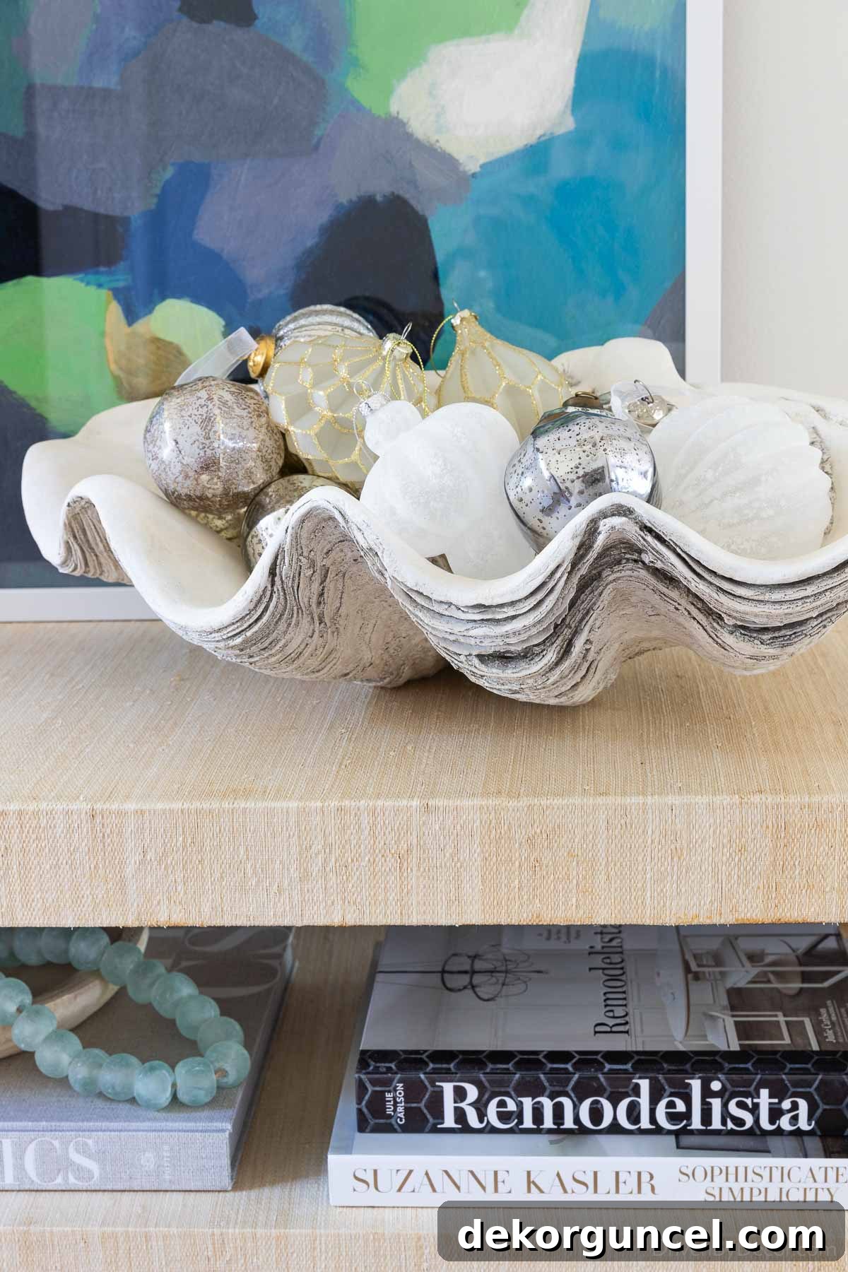 Decorative clamshell elegantly filled with festive ornaments, a versatile home accent