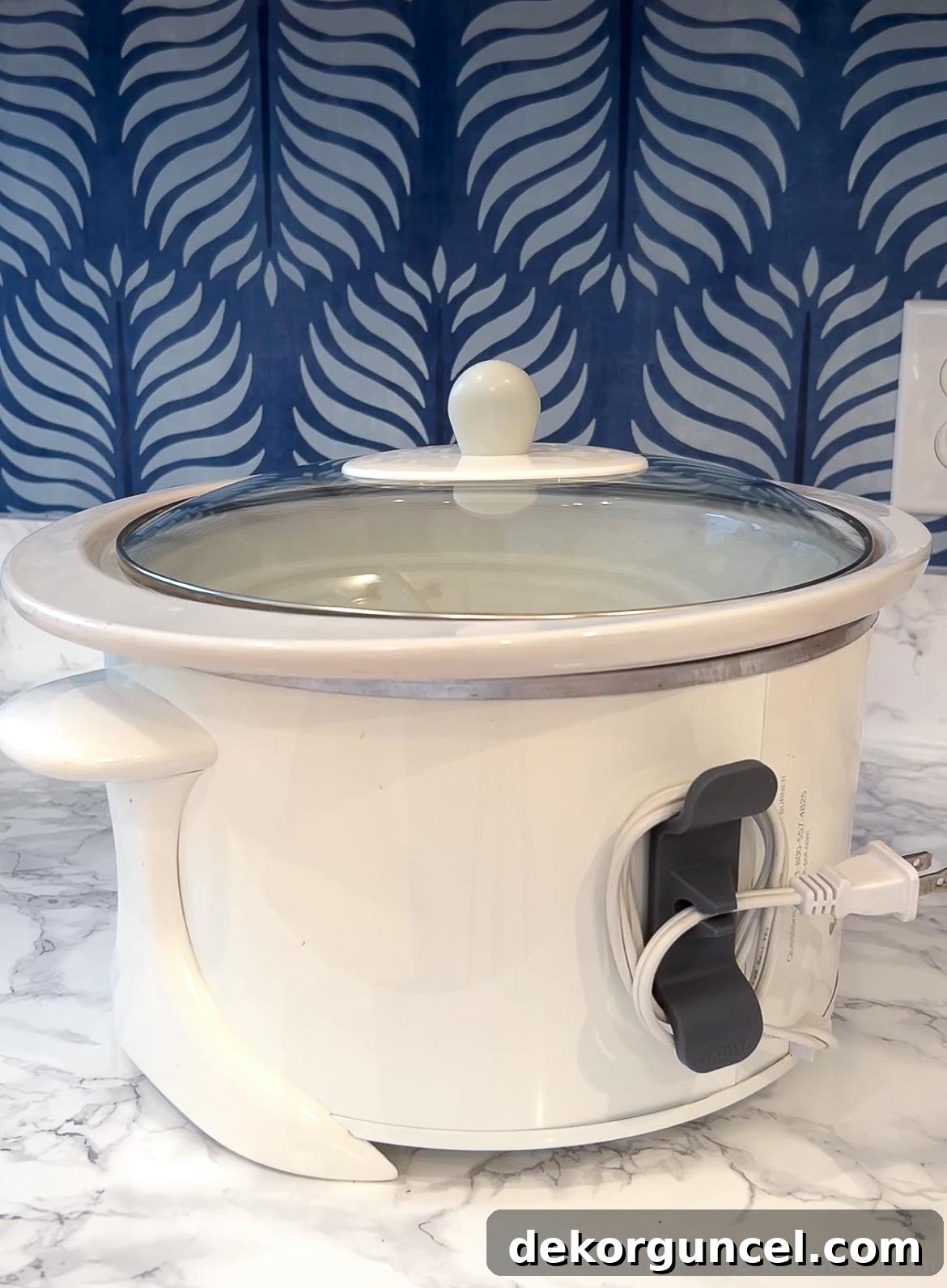 Cord organizer for small appliances, ensuring neat and easy storage