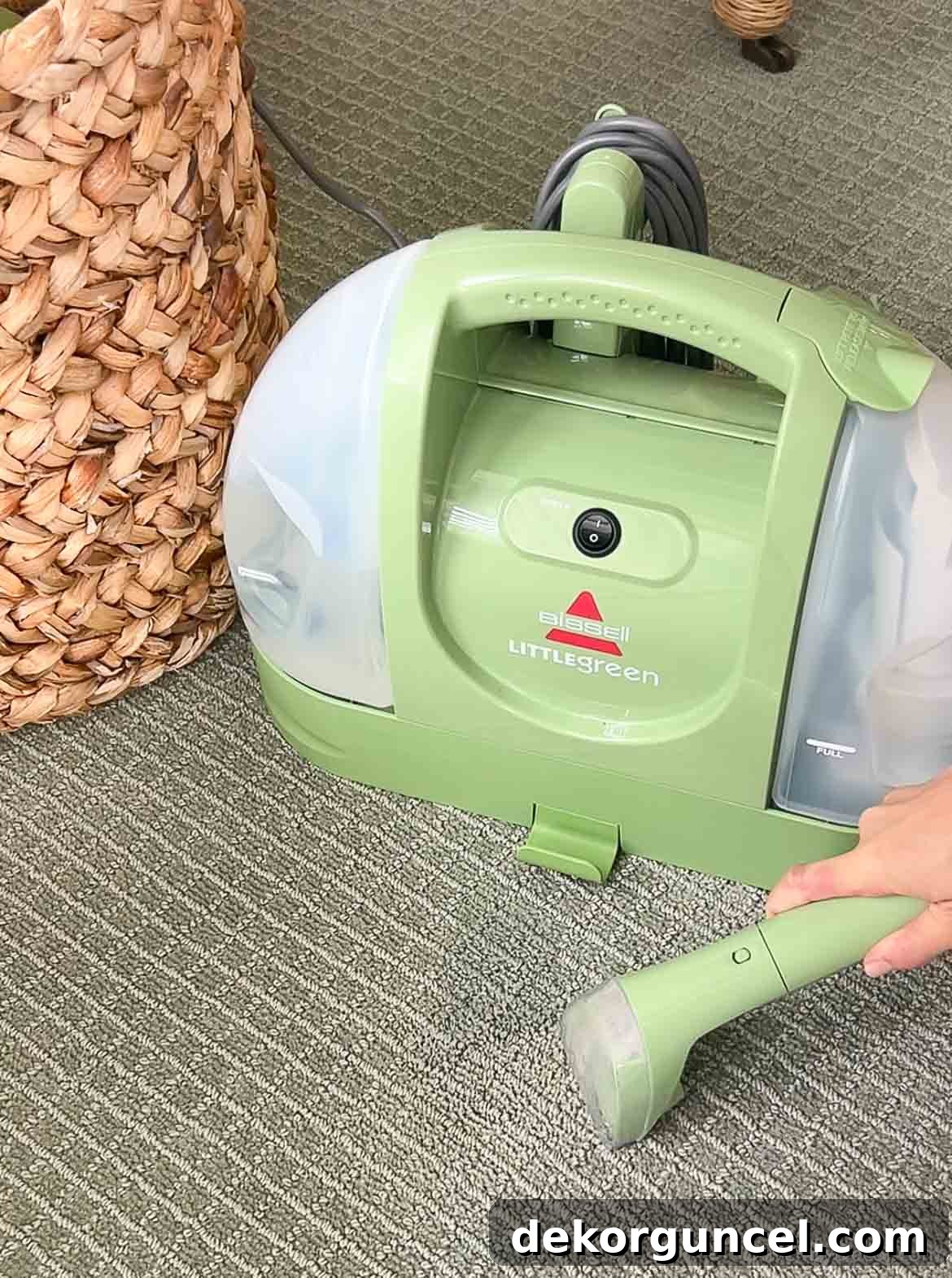 Bissell carpet cleaner efficiently removing a carpet stain, demonstrating its powerful cleaning capabilities