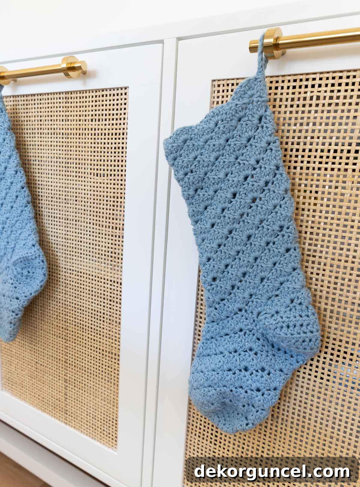 Beautiful hand-knit blue Christmas stockings, a cherished and personal holiday decoration