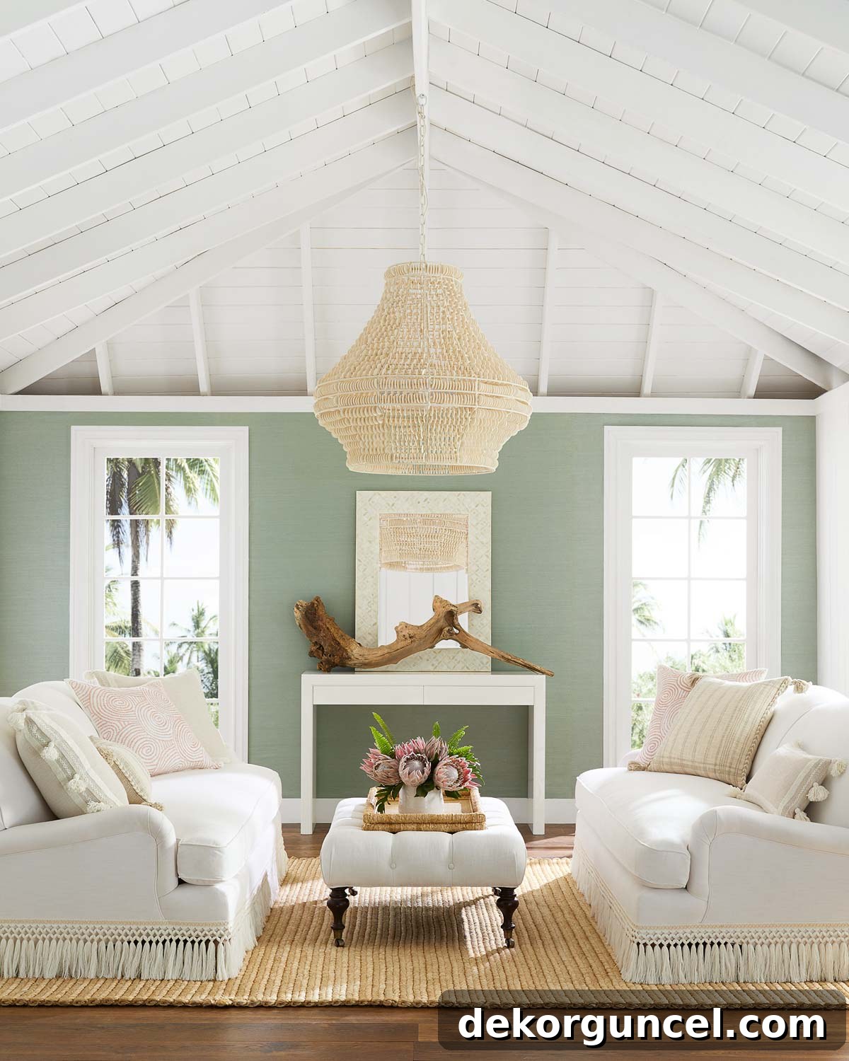 2021 design trends highlight Grandmillennial style, exemplified by these gorgeous sofas with elegant fringe detailing, adding a sophisticated touch of vintage charm.