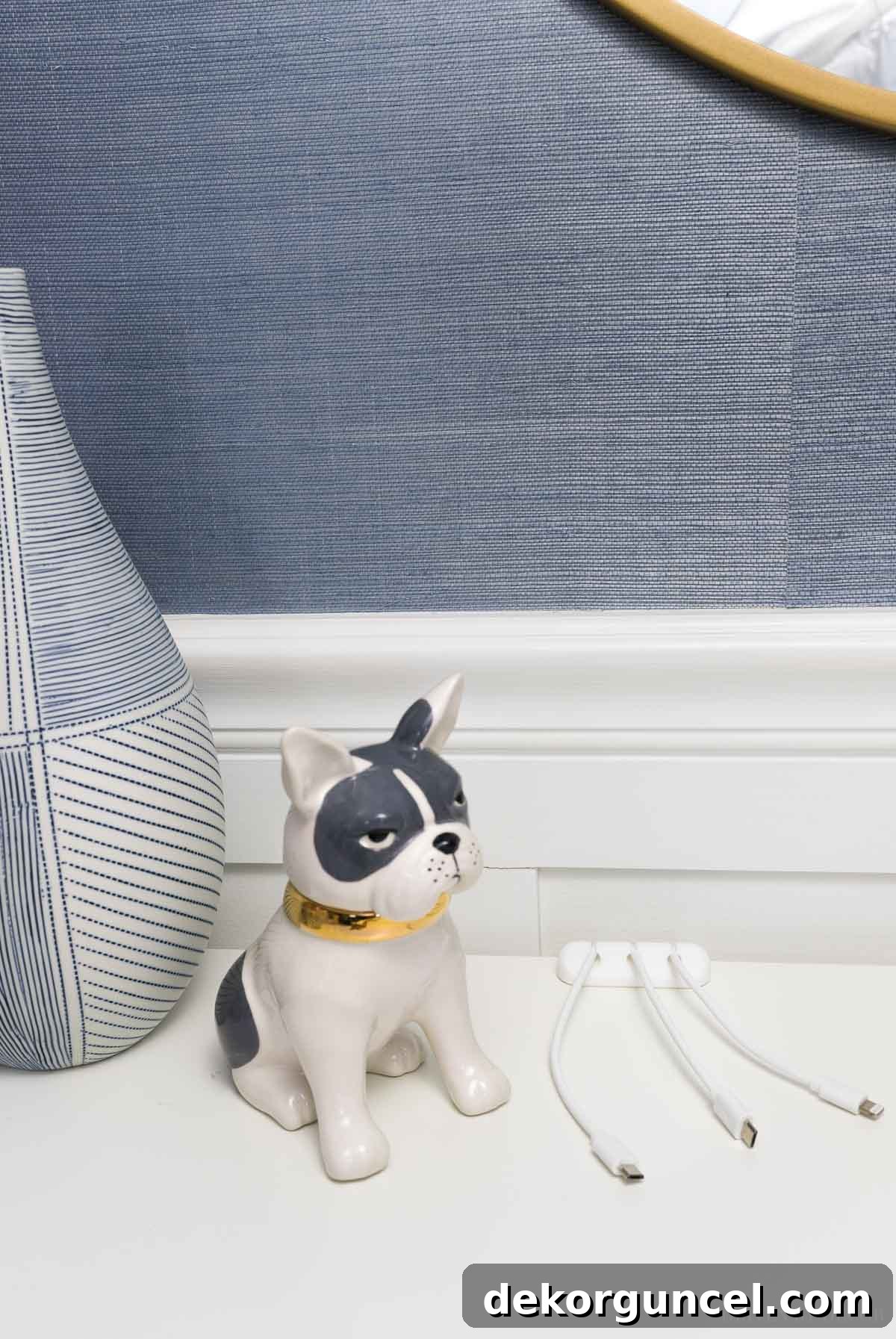 So smart! This small cord holder strip keeps your cords from falling behind your desk, one of the best desk organization ideas!