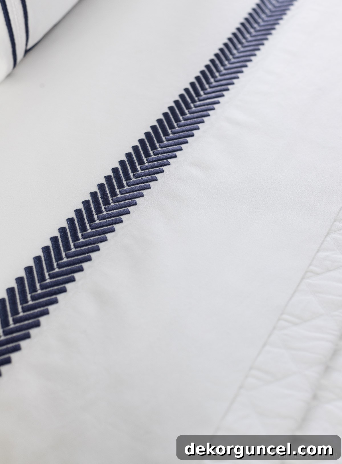 The Ultimate Guide to Fluffy Duvet Inserts 7 Secrets for a Luxurious Hotel Bed 12 Elegant navy embroidered sheet set, adding a touch of luxury to your bed.
