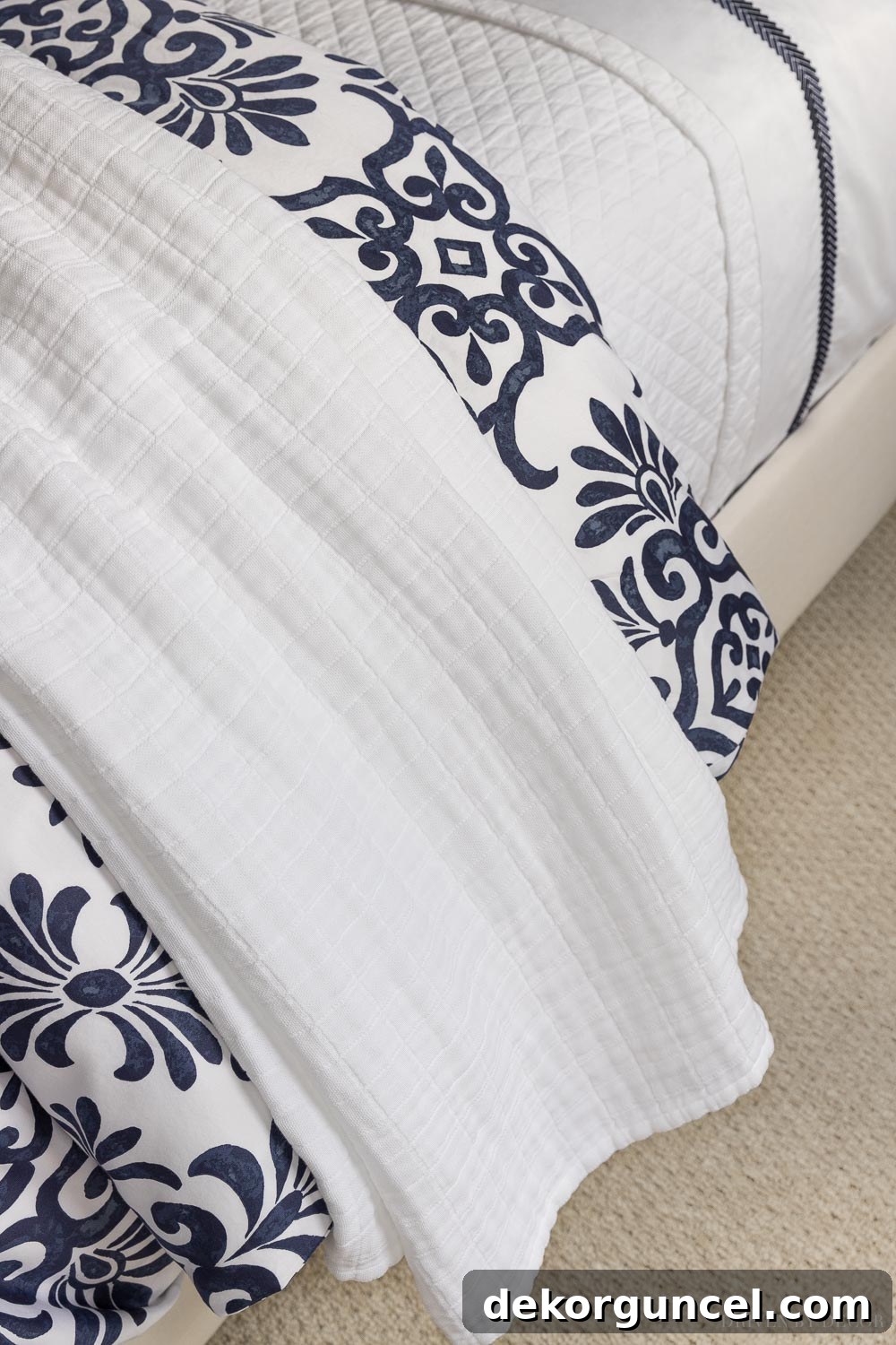 The Ultimate Guide to Fluffy Duvet Inserts 7 Secrets for a Luxurious Hotel Bed 14 A lightweight, warm, and cozy cotton blanket, perfect for layering on any bed.