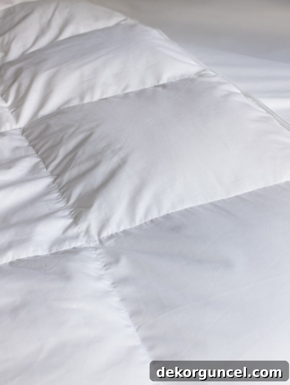 The Ultimate Guide to Fluffy Duvet Inserts 7 Secrets for a Luxurious Hotel Bed 5 Close-up of a duvet insert with baffle box construction, showing its even loft.