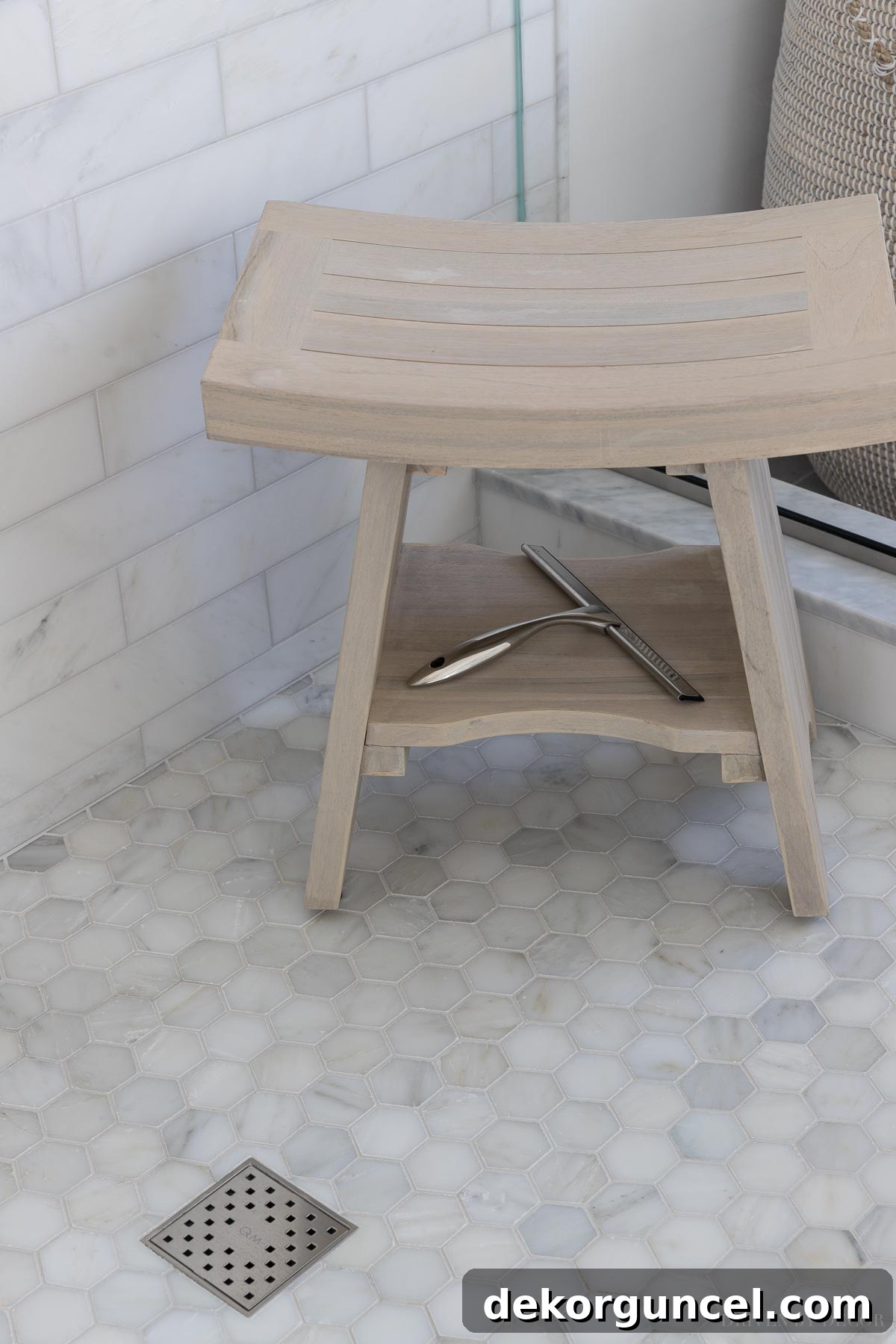 Essential squeegee for daily marble shower maintenance, preventing mold and mildew buildup.