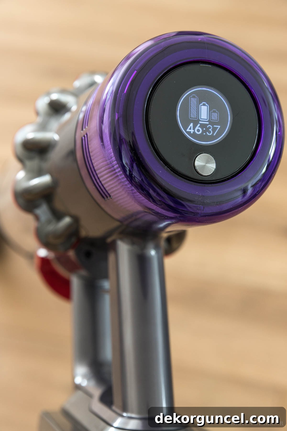 Shark vs. Dyson Cordless Showdown 5 The sophisticated digital display on the Dyson v11 and v15 cordless vacuums provides a precise, estimated remaining battery life, enhancing user experience.