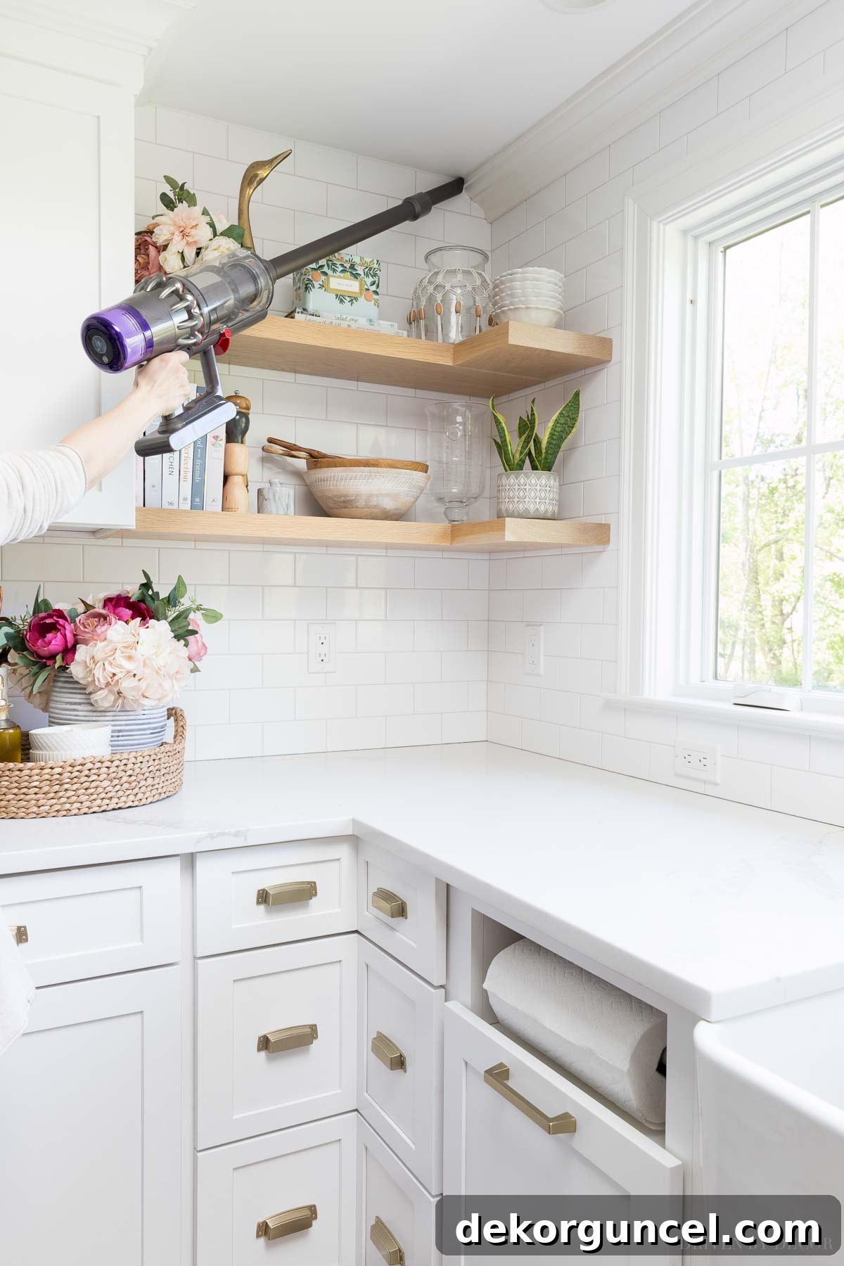 Shark vs. Dyson Cordless Showdown 10 Using the Dyson cordless vacuum as a handvac with its extension tool allows for effortless cleaning of hard-to-reach areas, a highly versatile feature.