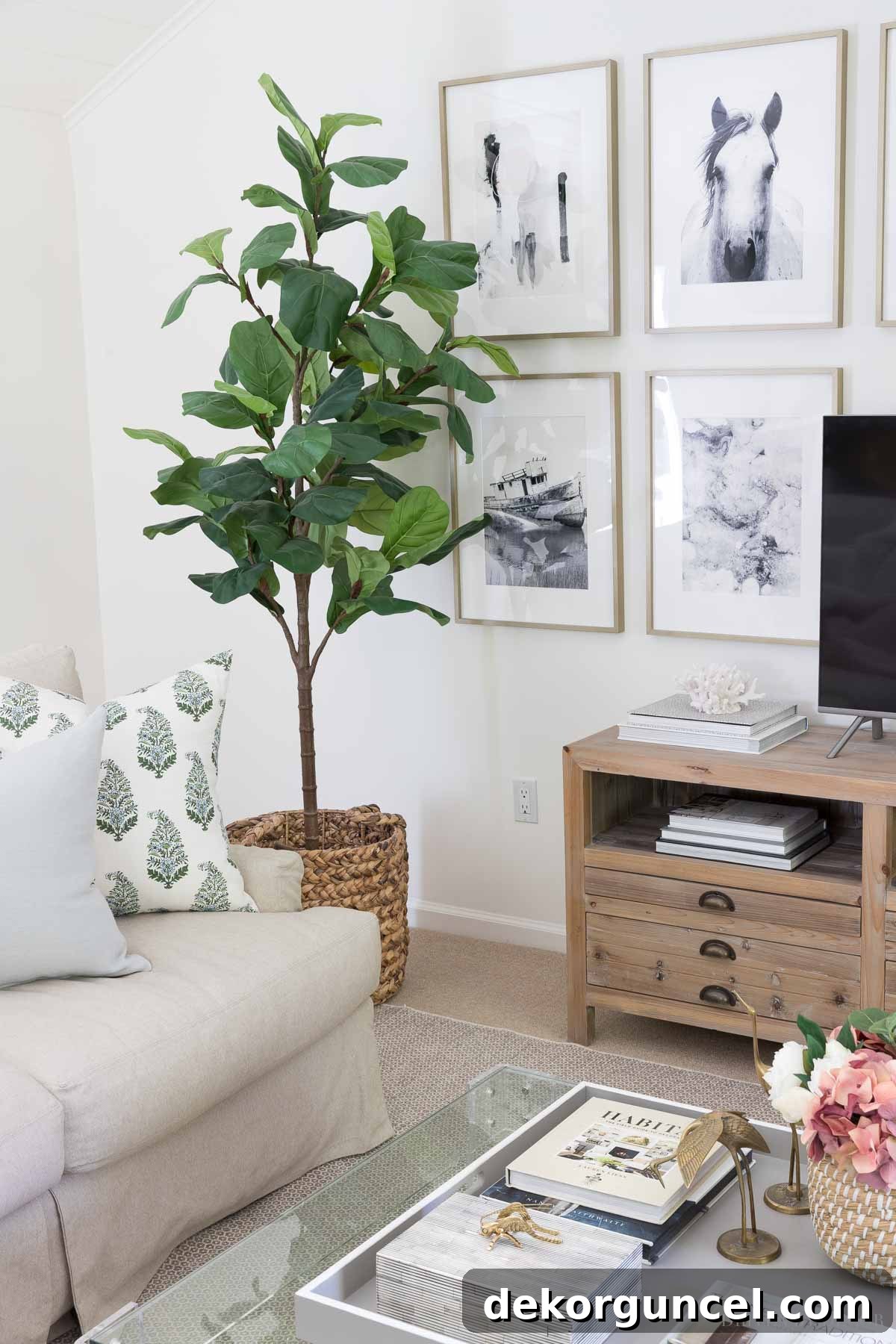 The Most Realistic Faux Flowers 21 A stunning 7-foot tall realistic artificial fiddle leaf fig tree, beautifully placed in a stylish woven basket, enhancing the corner of a family room with natural elegance and lush greenery.