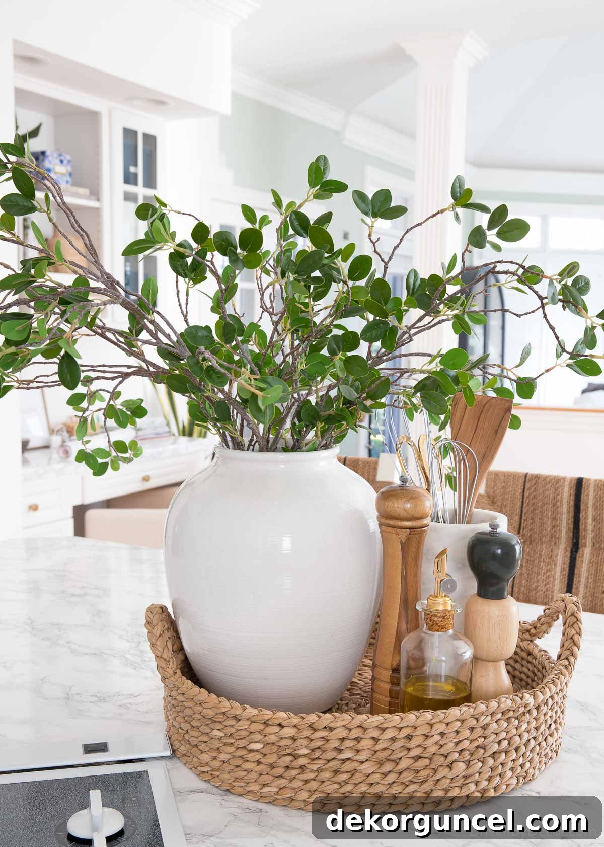 The Most Realistic Faux Flowers 10 Versatile faux greenery branches adding a touch of natural elegance to a kitchen space, ideal for console table decor or a kitchen island centerpiece, before a remodel.