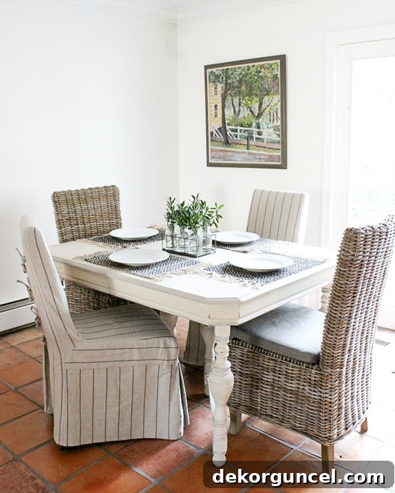 Kitchen eat-in area before remodeling, showing limited space and baseboard heating