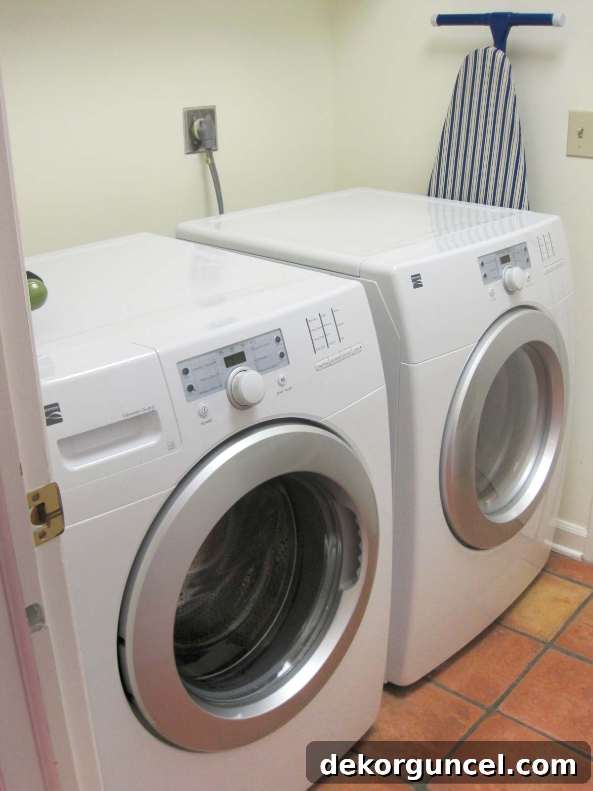 Laundry room before remodeling, showing washer and dryer without a countertop