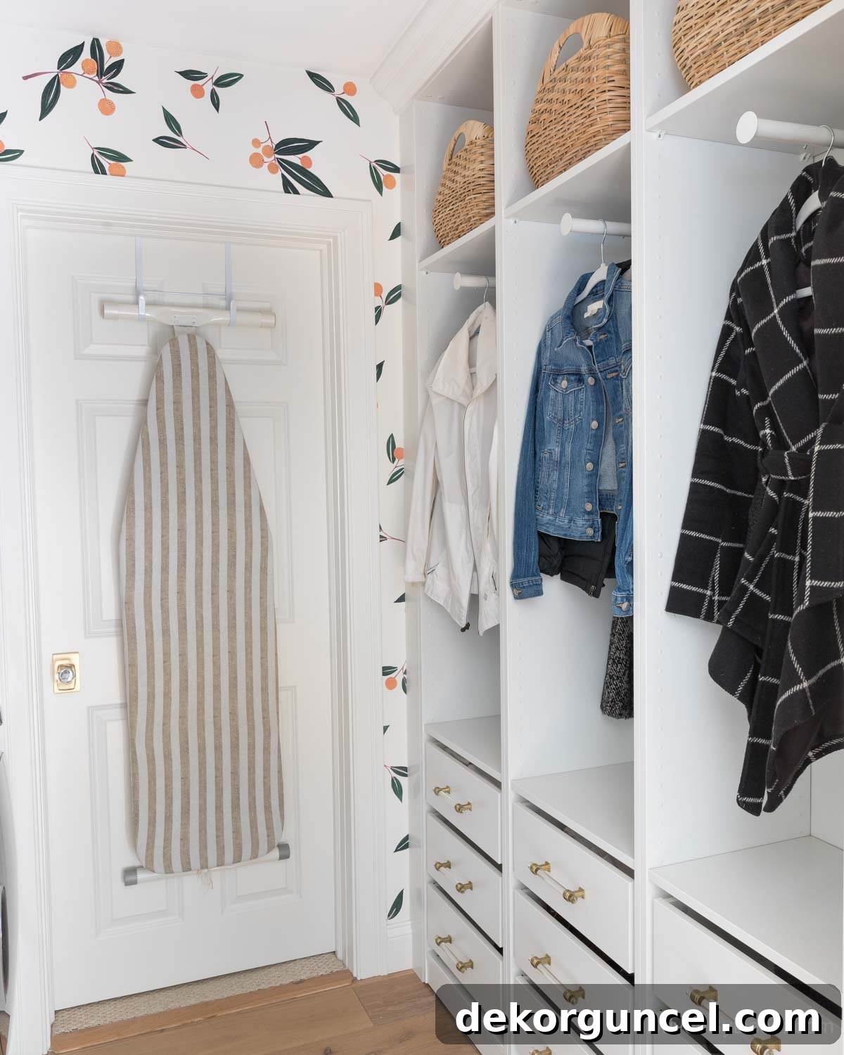Laundry room after remodeling, with a new mudroom nook created using IKEA PAX wardrobes for coat and shoe storage