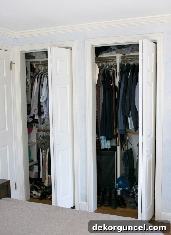 Master closet before, showing twin bifold doors and a central wall impediment