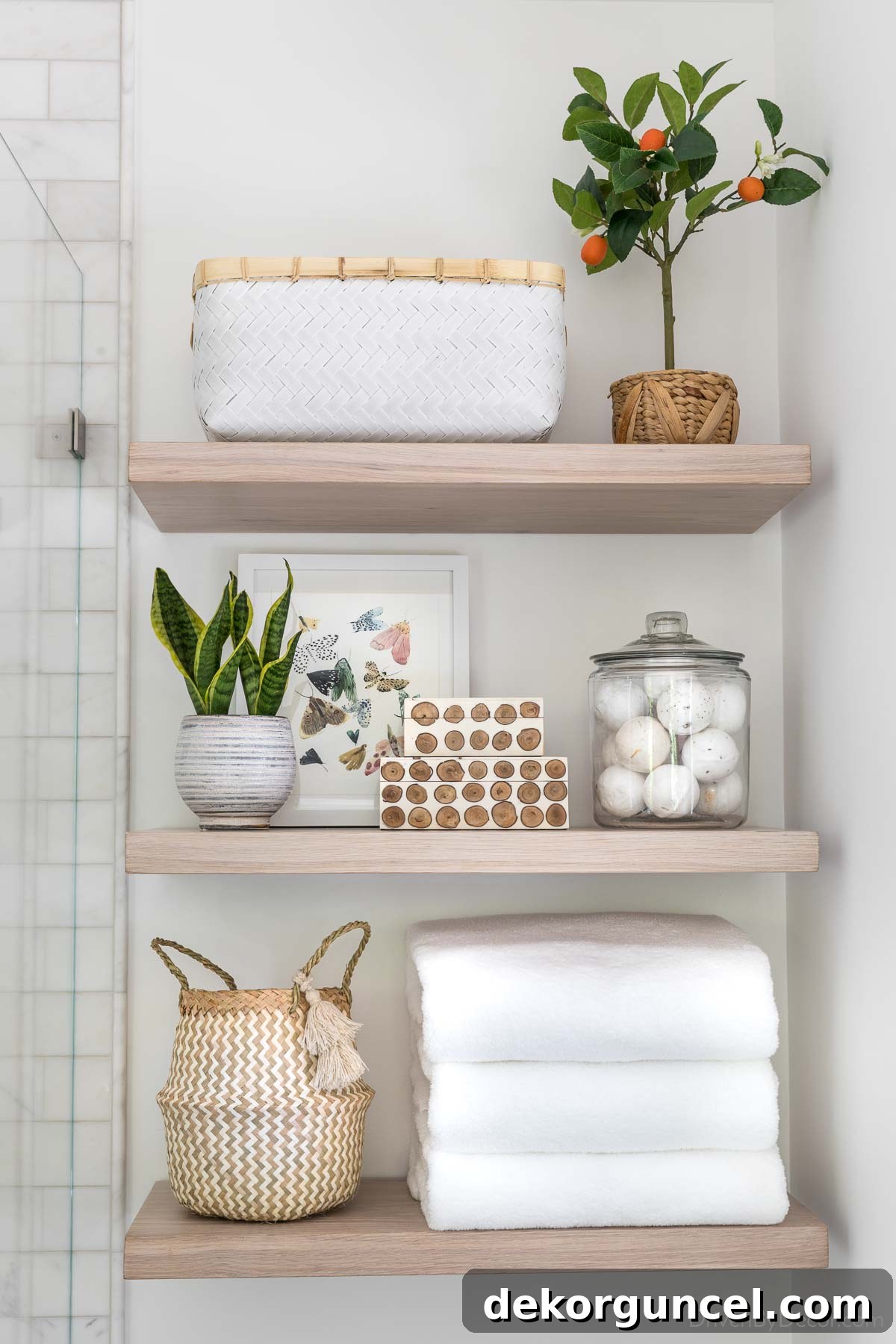 Floating shelves in master bathroom, showcasing both decorative and hidden storage solutions