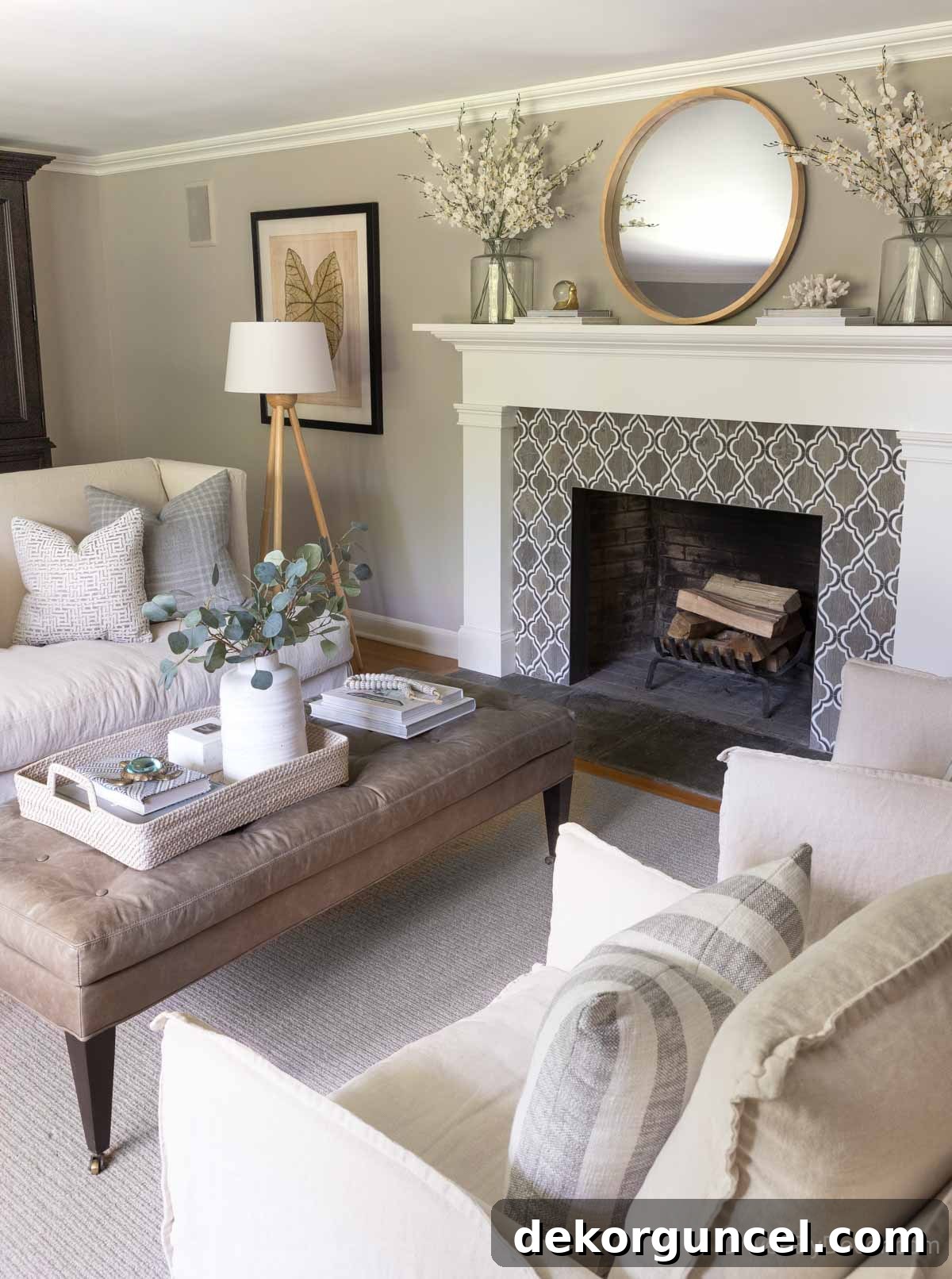 Living room after remodeling, with a stylish retiled fireplace and updated surround