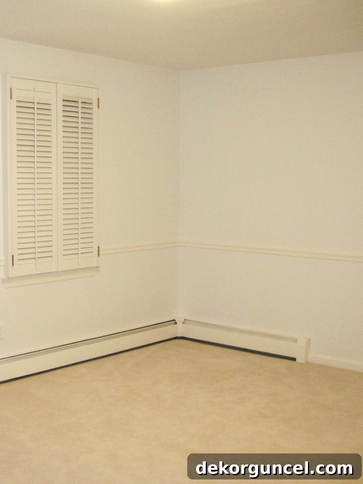 Teen bedroom before remodeling, showcasing plain walls and basic molding