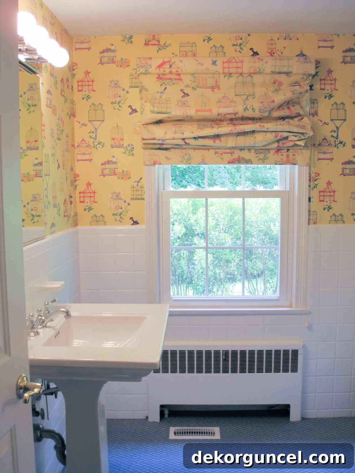 Powder room before remodeling, showing blue carpet over ugly red tile floors