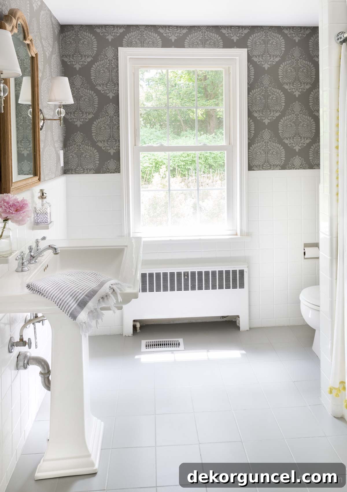 Powder room after remodeling, featuring beautifully painted tile floors