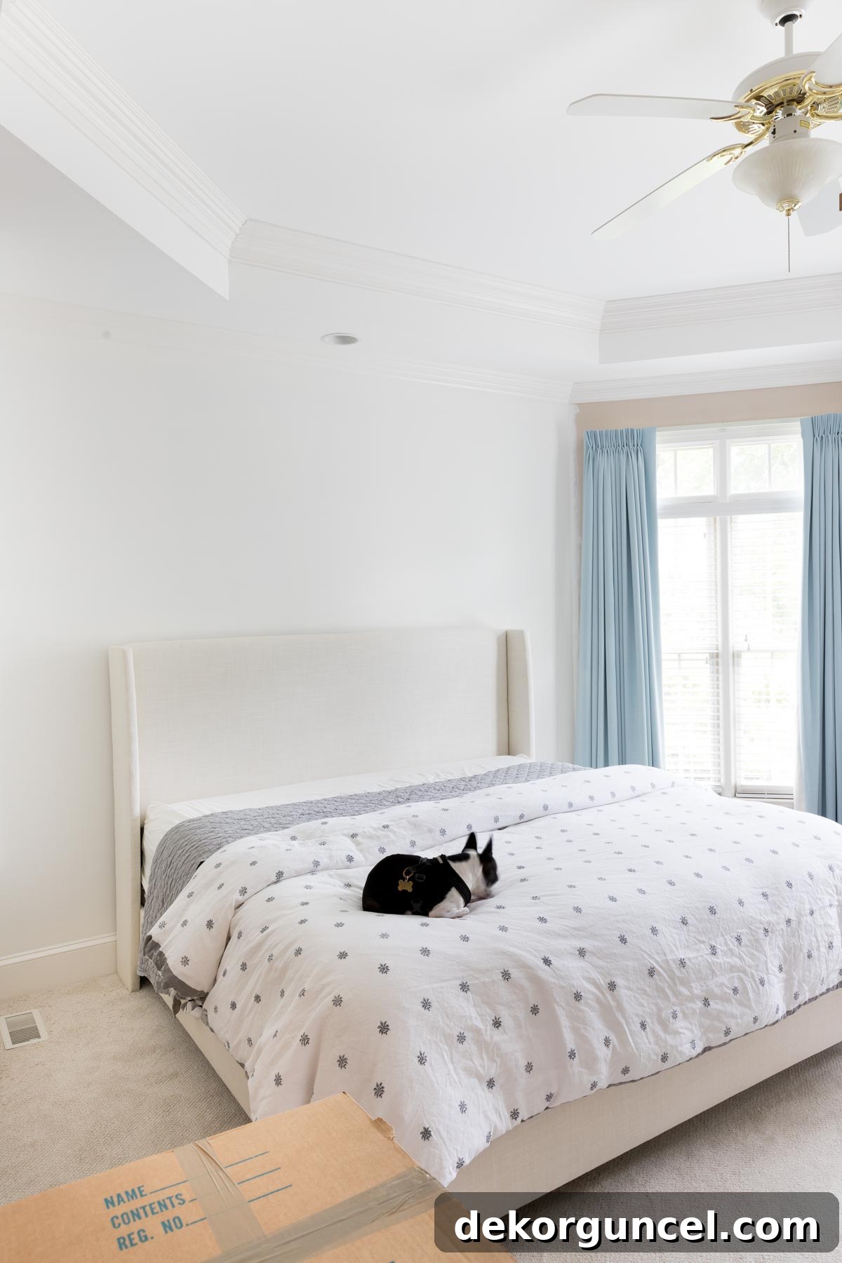 Our master bedroom, cozy and inviting, shortly after moving in and setting up the new bed.
