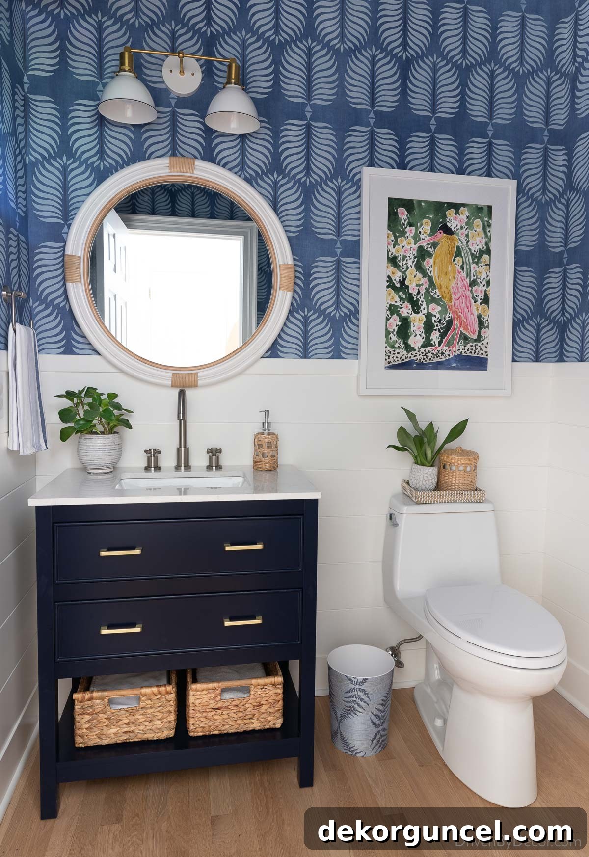Elevated Powder Room Reflections 3 Transformed powder room with shiplap walls, botanical wallpaper, modern vanity, and a round rattan mirror