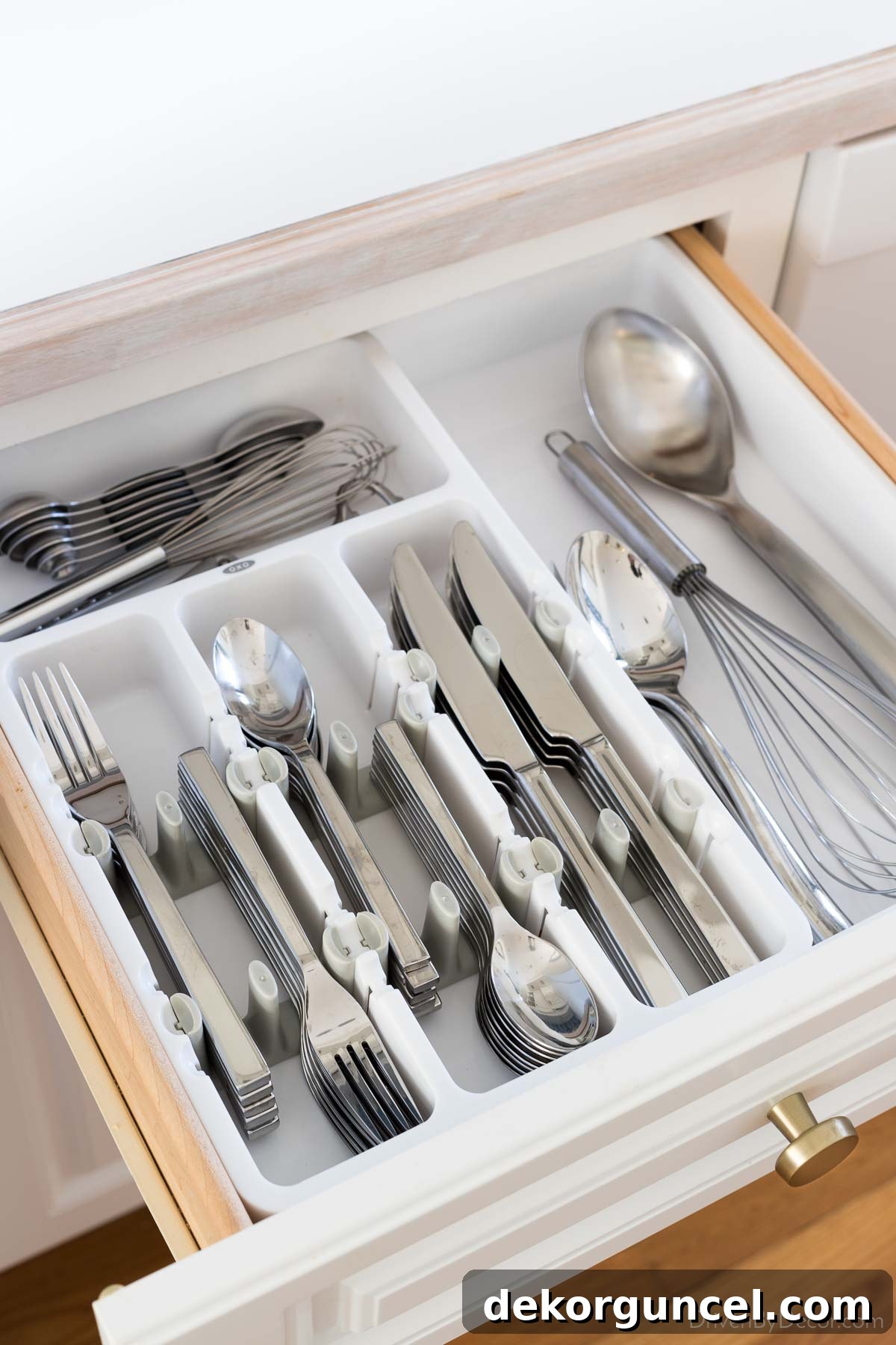 This expandable kitchen drawer organizer is perfect for keeping silverware and cutlery
