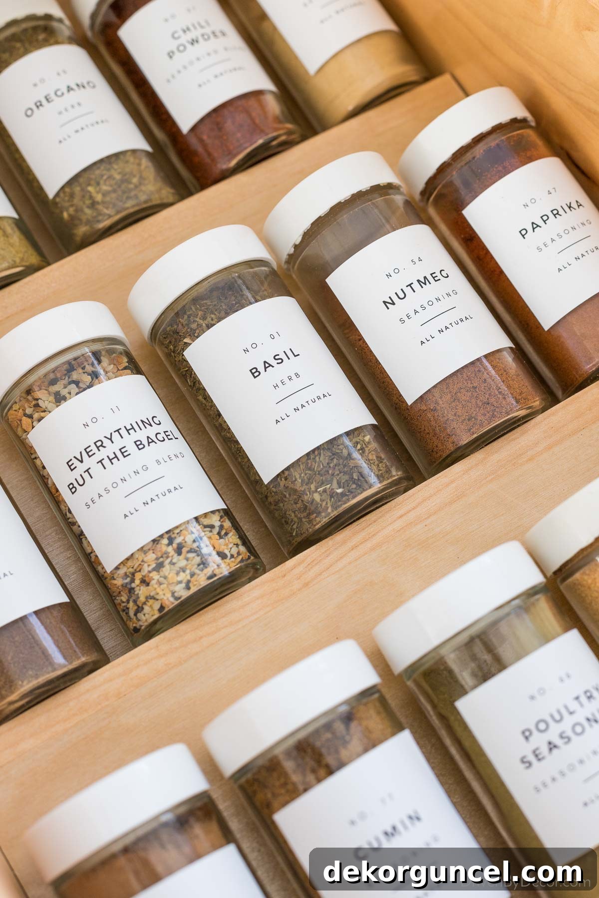 Spice jars with simple matching labels helped organize them in our kitchen drawers!