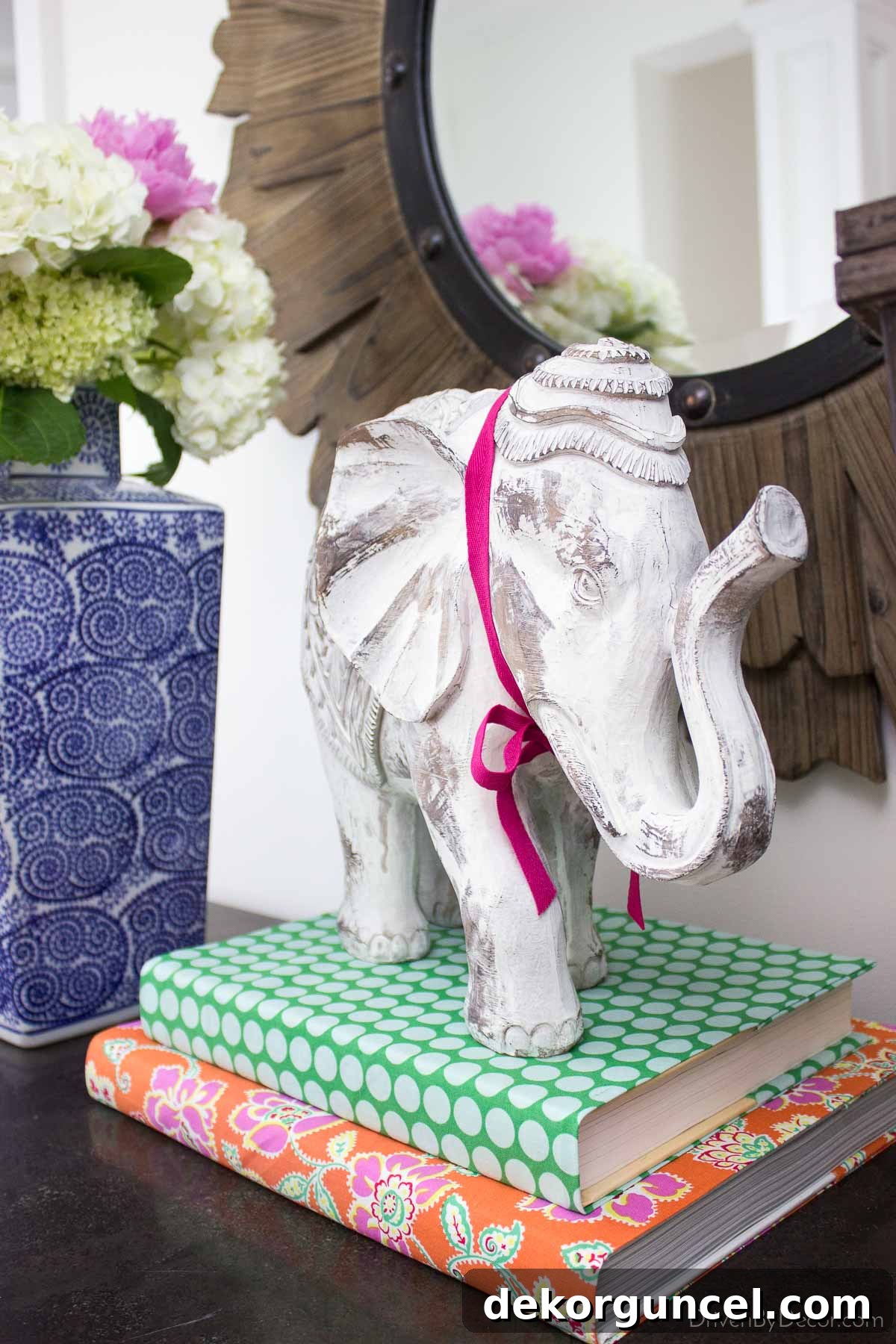 10 Creative Wallpaper Ideas for a Stunning Home Makeover 6 Wrap books with colorful wallpaper or fabrics to decorate seasonally, a delightful and easy DIY idea.